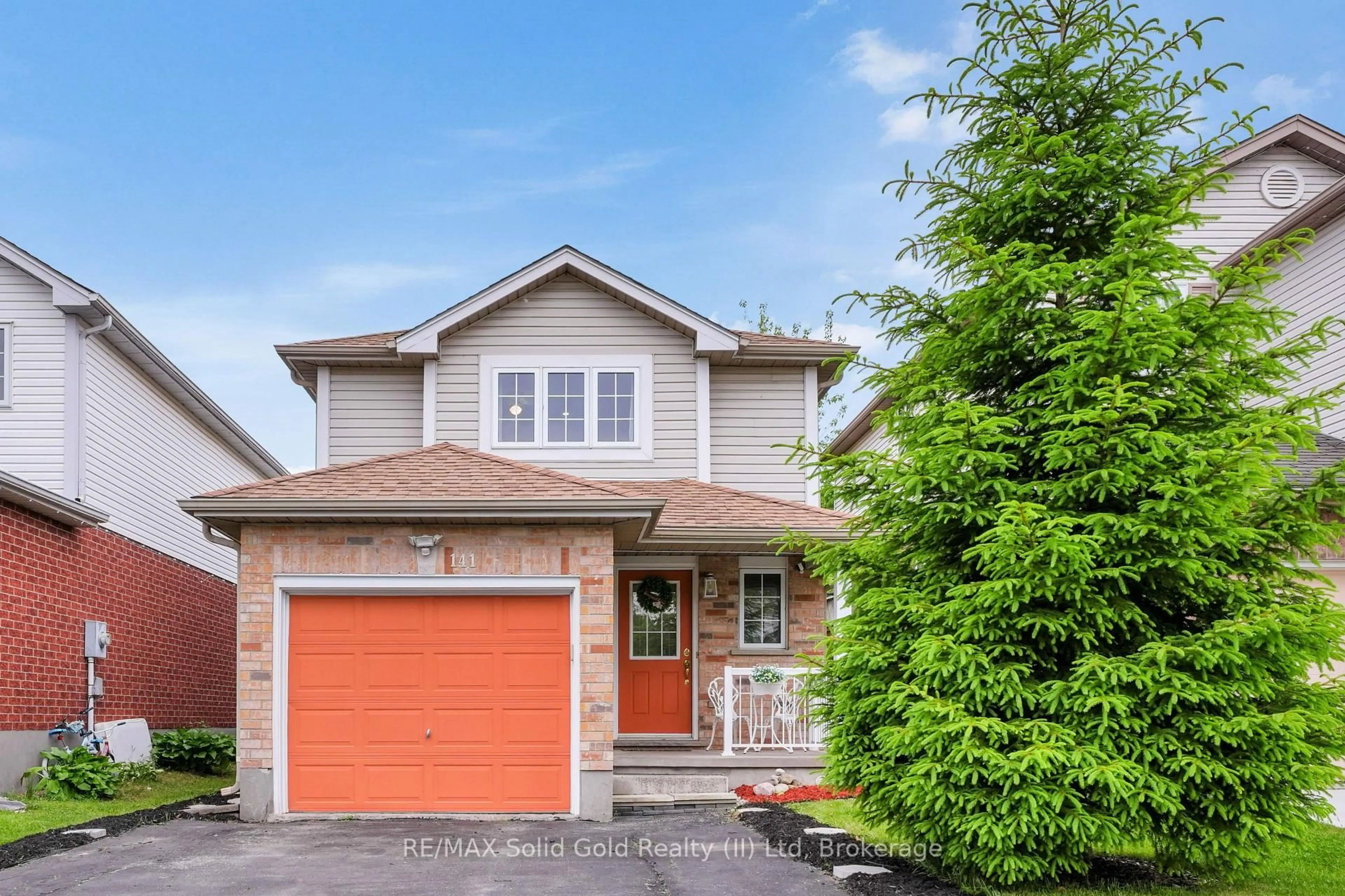 Home with brick exterior material, street for 141 Wilderness Dr, Kitchener Ontario N2E 3R8