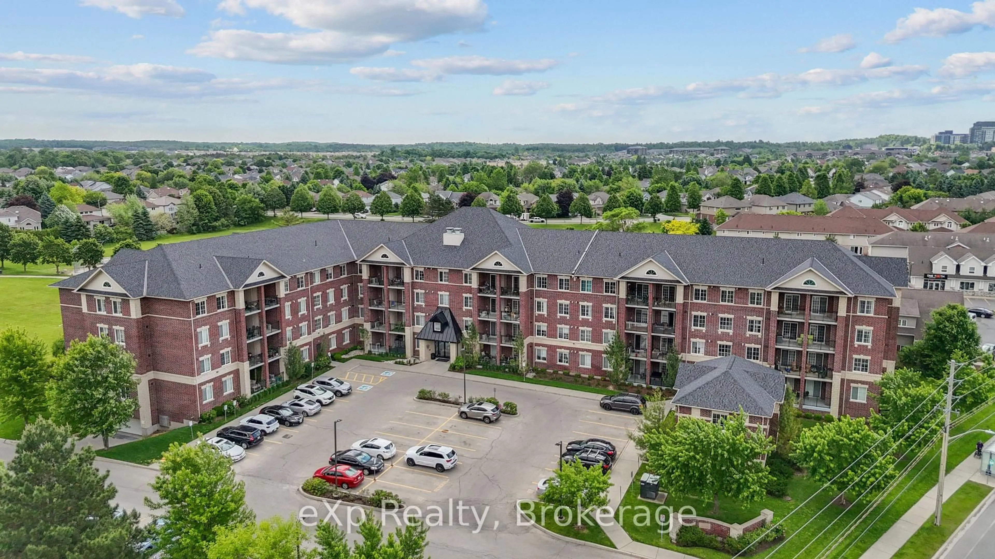 A pic from outside/outdoor area/front of a property/back of a property/a pic from drone, unknown for 1440 Gordon St #317, Guelph Ontario N1L 1C8