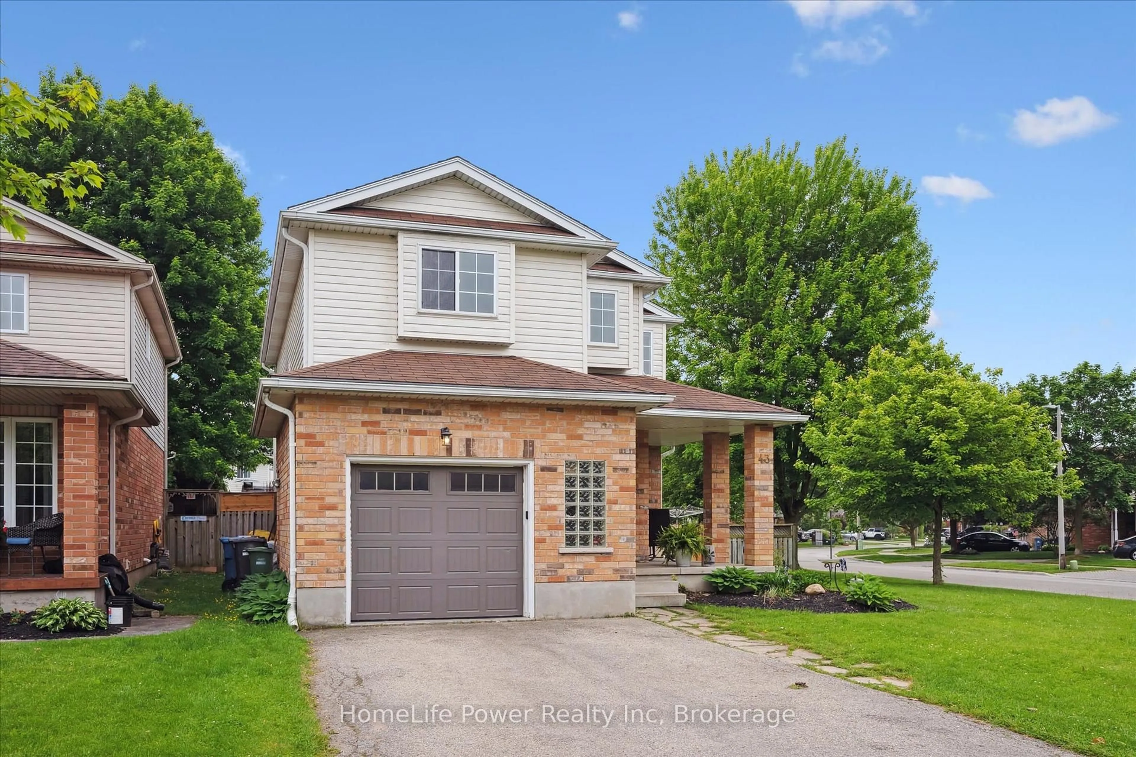 Home with brick exterior material, street for 43 Hill Tr, Guelph Ontario N1E 7C5