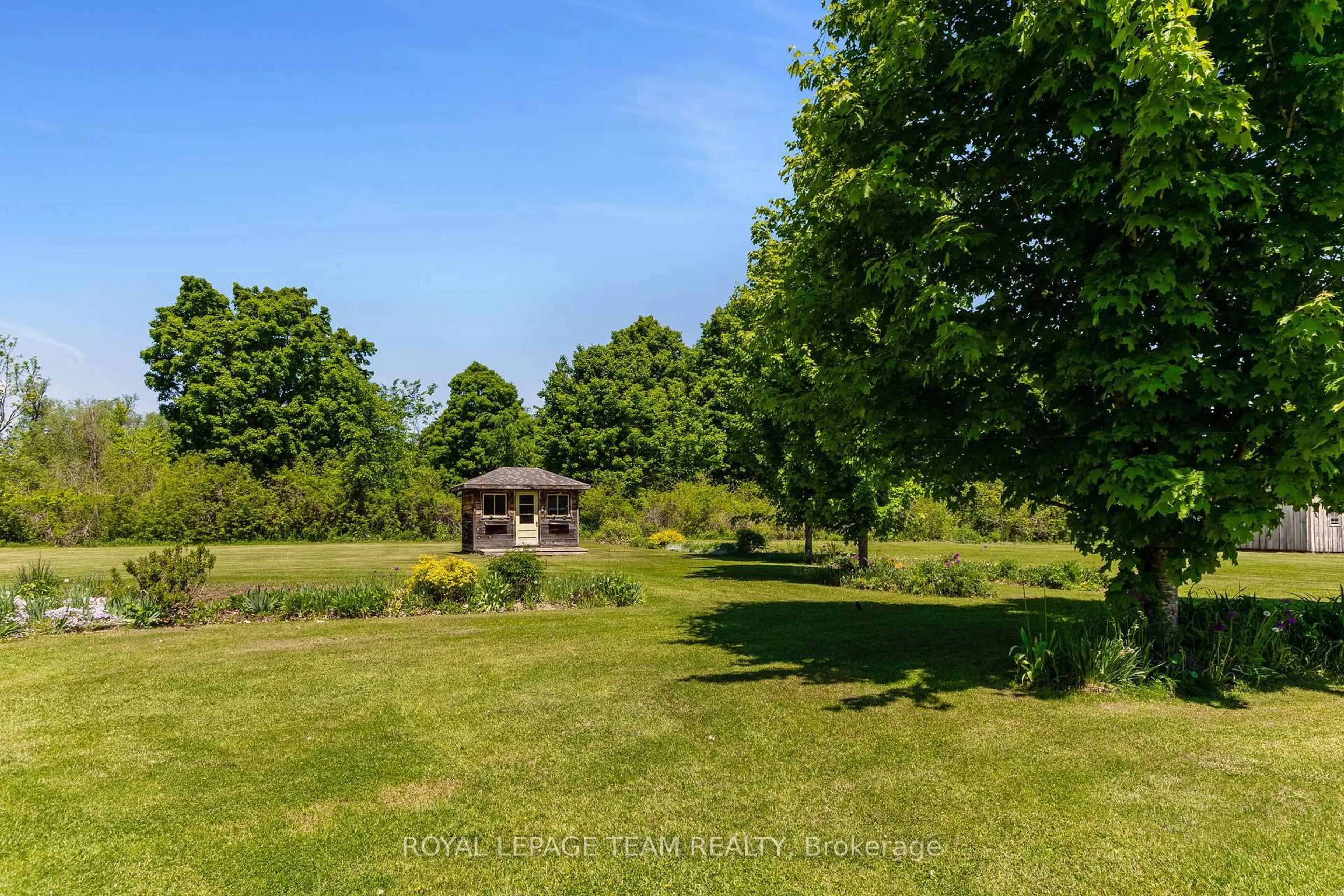 A pic from outside/outdoor area/front of a property/back of a property/a pic from drone, forest/trees view for 419 Lake Ave, Carleton Place Ontario K7C 3S7