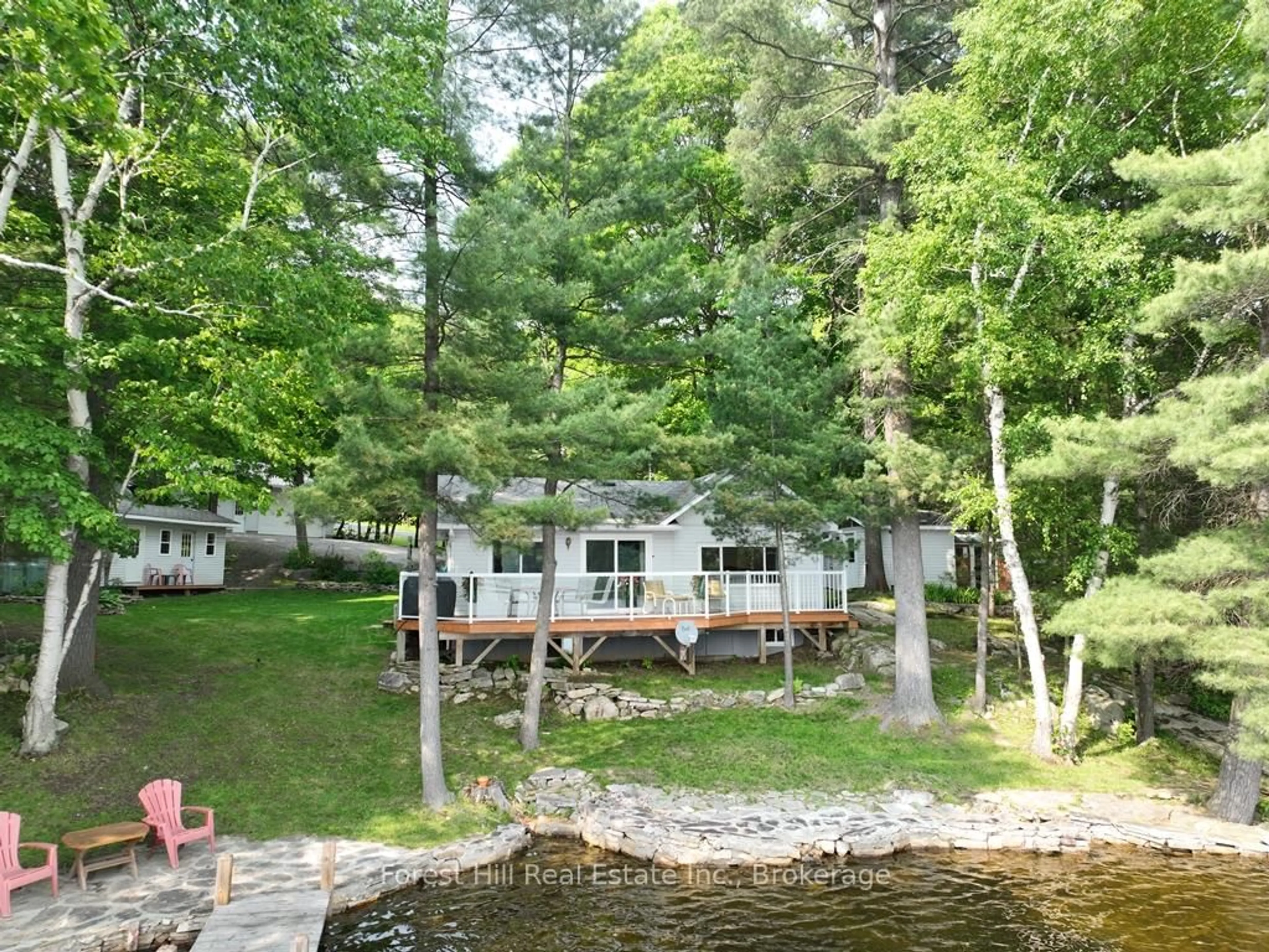 A pic from outside/outdoor area/front of a property/back of a property/a pic from drone, water/lake/river/ocean view for 1131 BUCKSLIDE Rd, Algonquin Highlands Ontario K0M 1J2