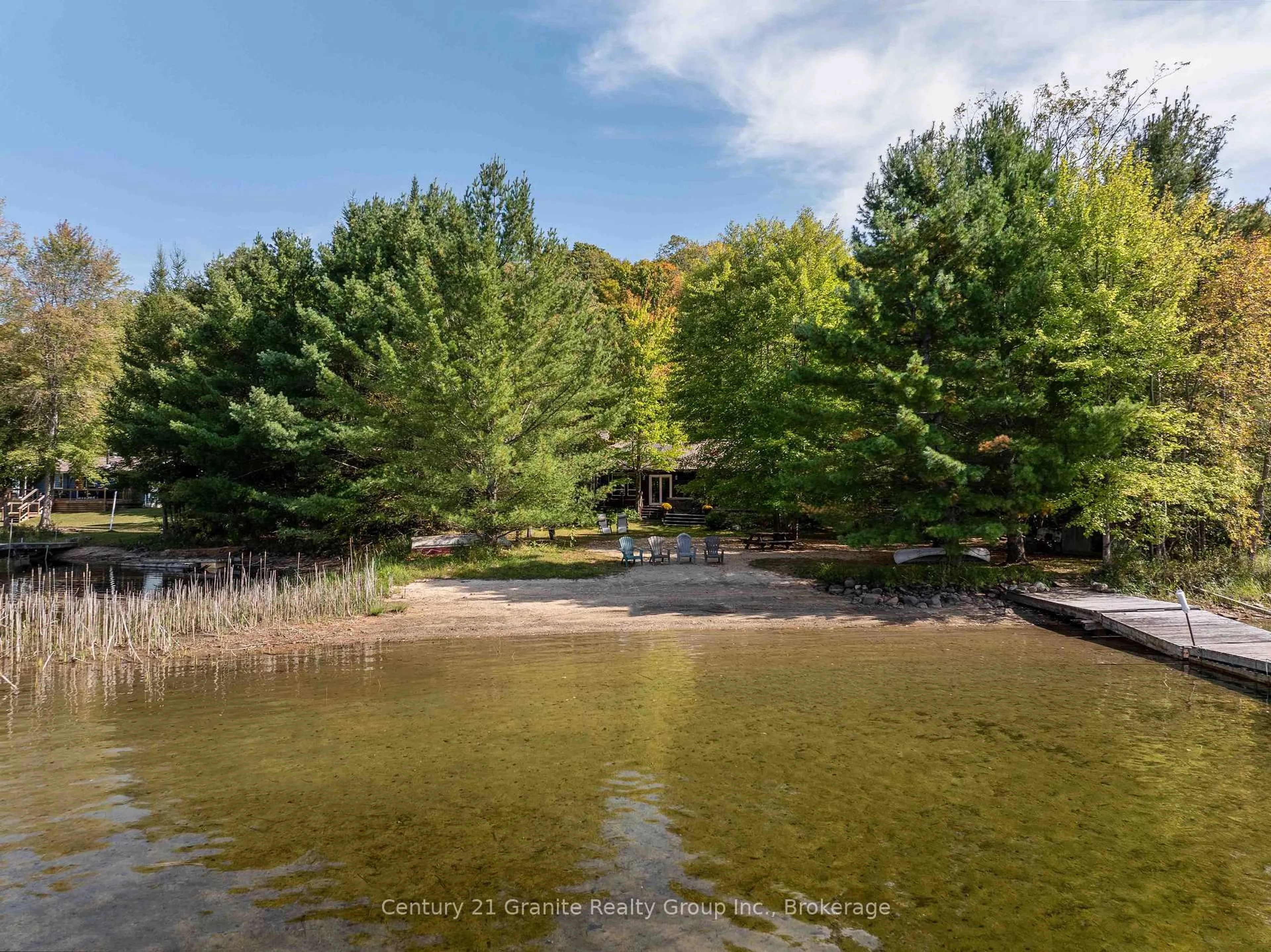 A pic from outside/outdoor area/front of a property/back of a property/a pic from drone, water/lake/river/ocean view for 1054 The Narrows Tr, Minden Hills Ontario K0M 2K0
