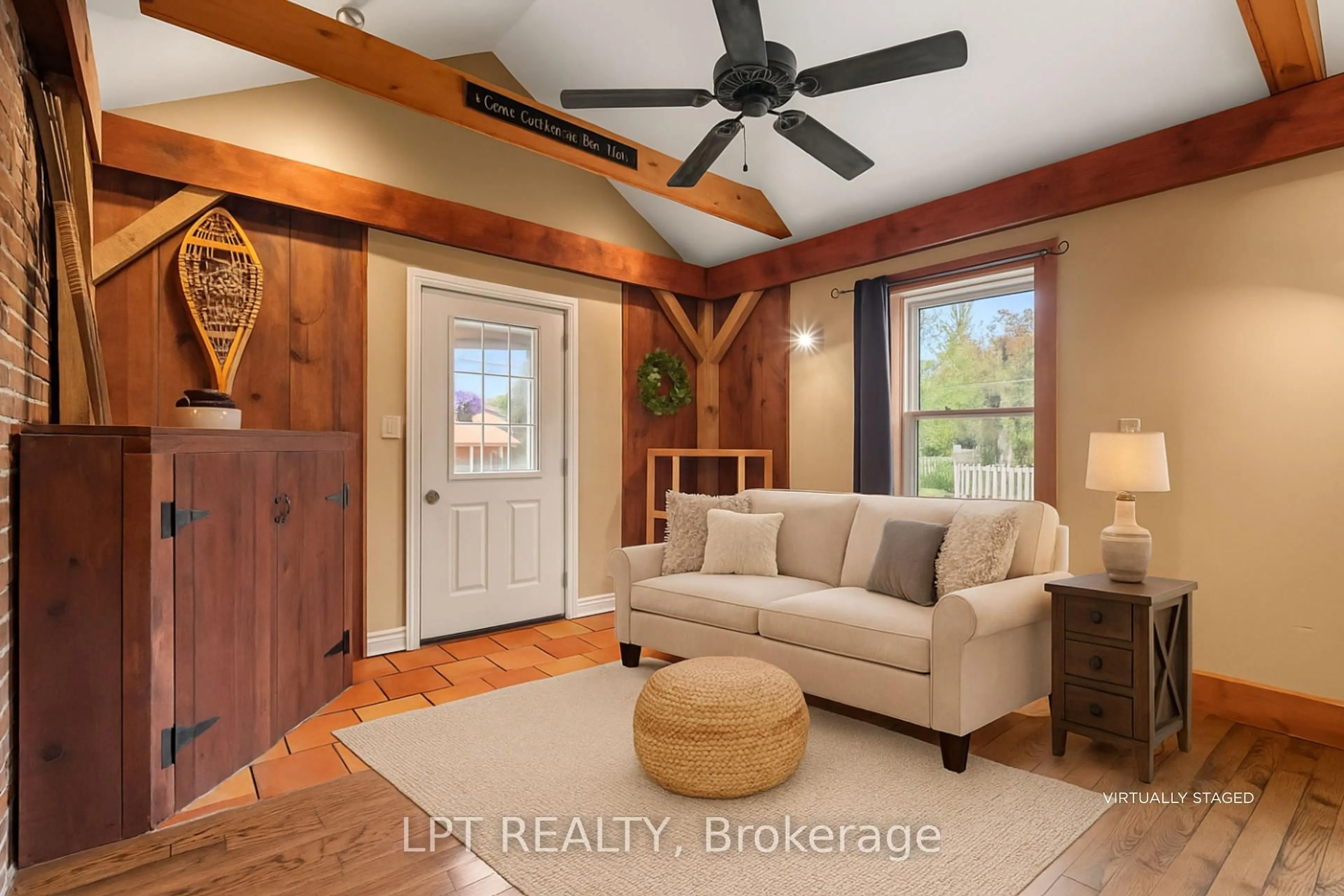 Living room with furniture, wood/laminate floor for 277 Brock St, Gananoque Ontario K7G 1K5