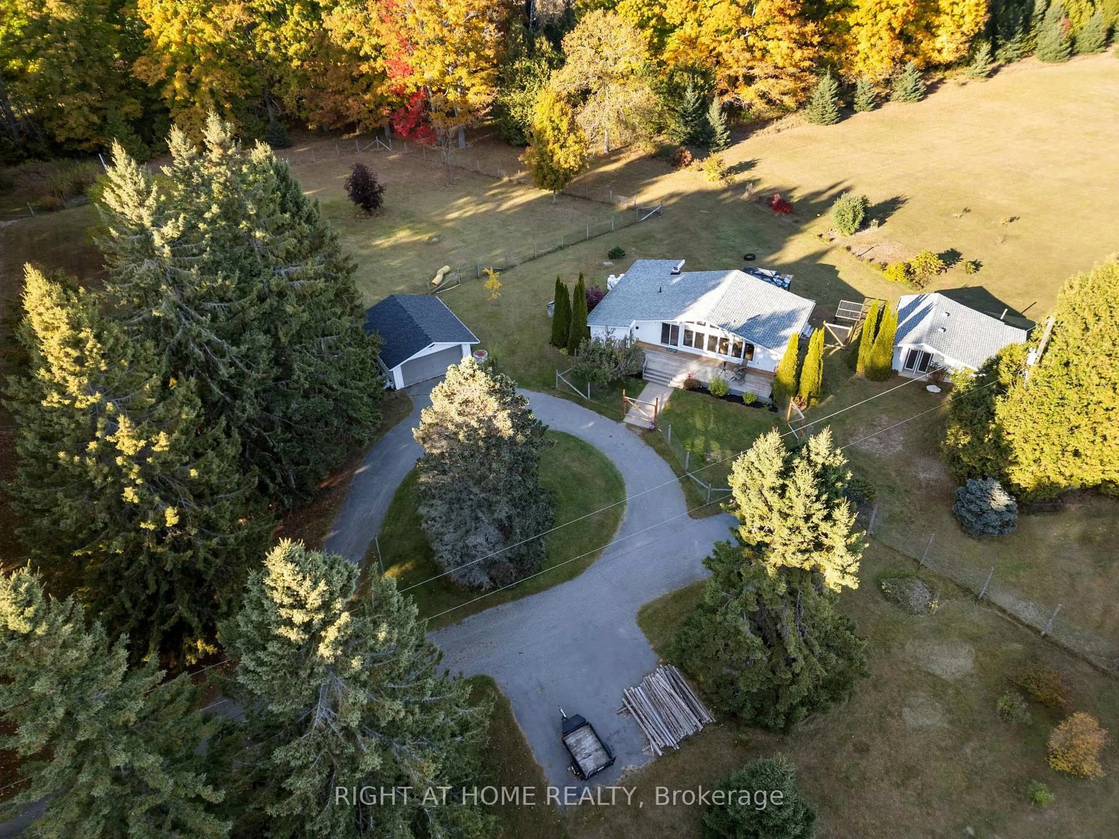 A pic from outside/outdoor area/front of a property/back of a property/a pic from drone, forest/trees view for 203 Barnes Rd, Brighton Ontario K0K 1H0