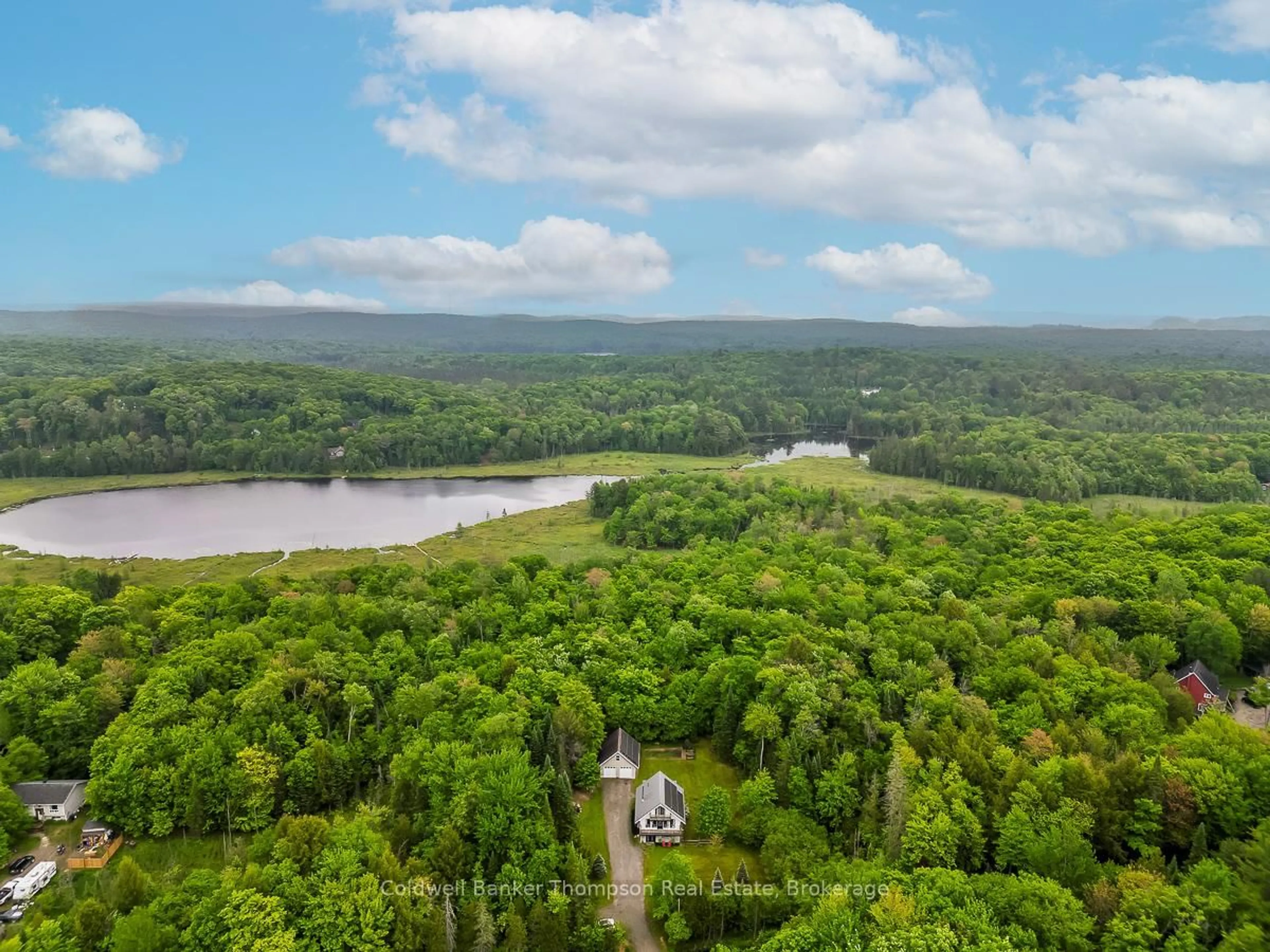 A pic from outside/outdoor area/front of a property/back of a property/a pic from drone, water/lake/river/ocean view for 579 South Waseosa Lake Rd, Huntsville Ontario P1H 2N5
