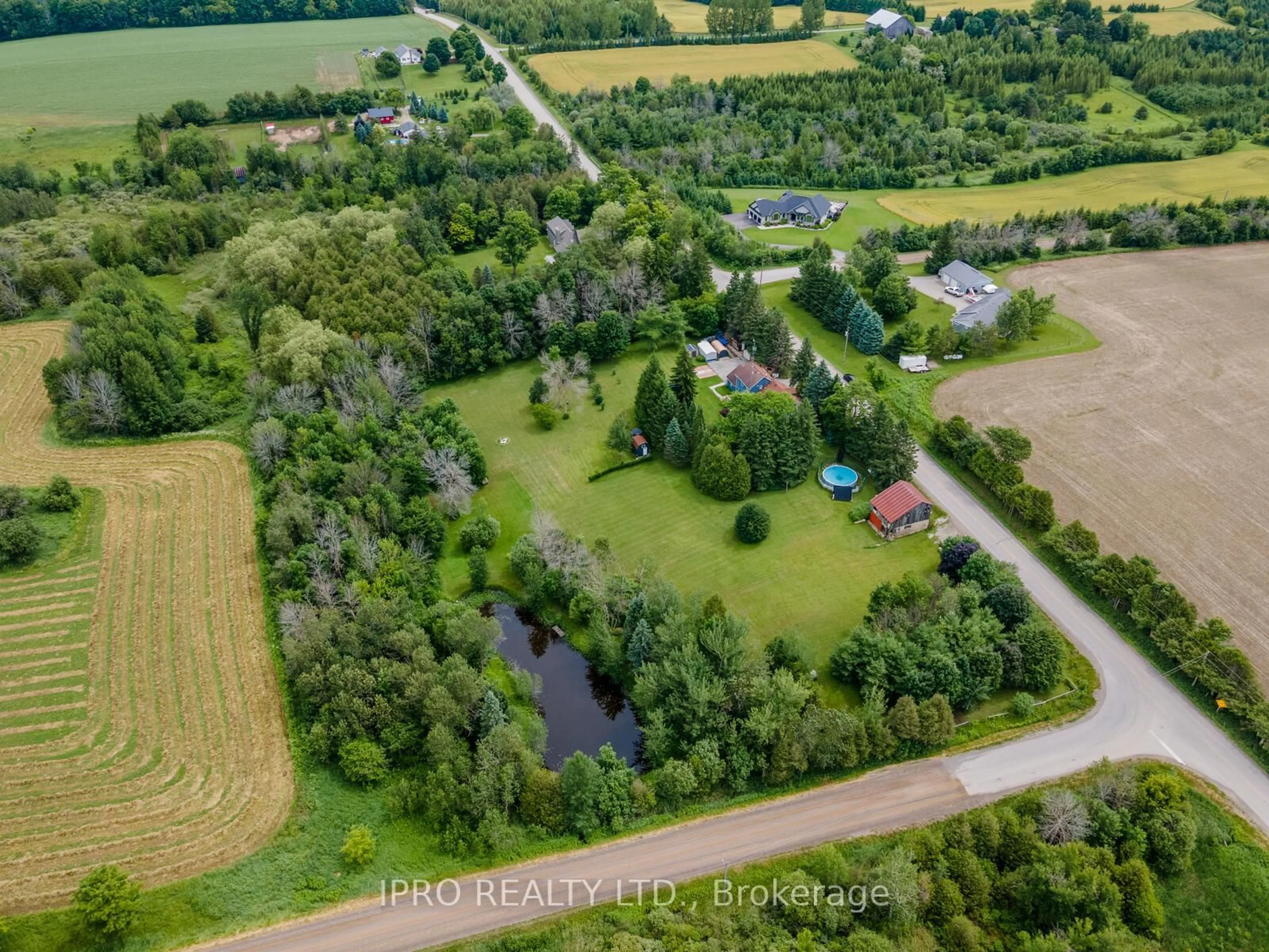 A pic from outside/outdoor area/front of a property/back of a property/a pic from drone, unknown for 9206 Sideroad 17 Rd, Erin Ontario N0B 1Z0