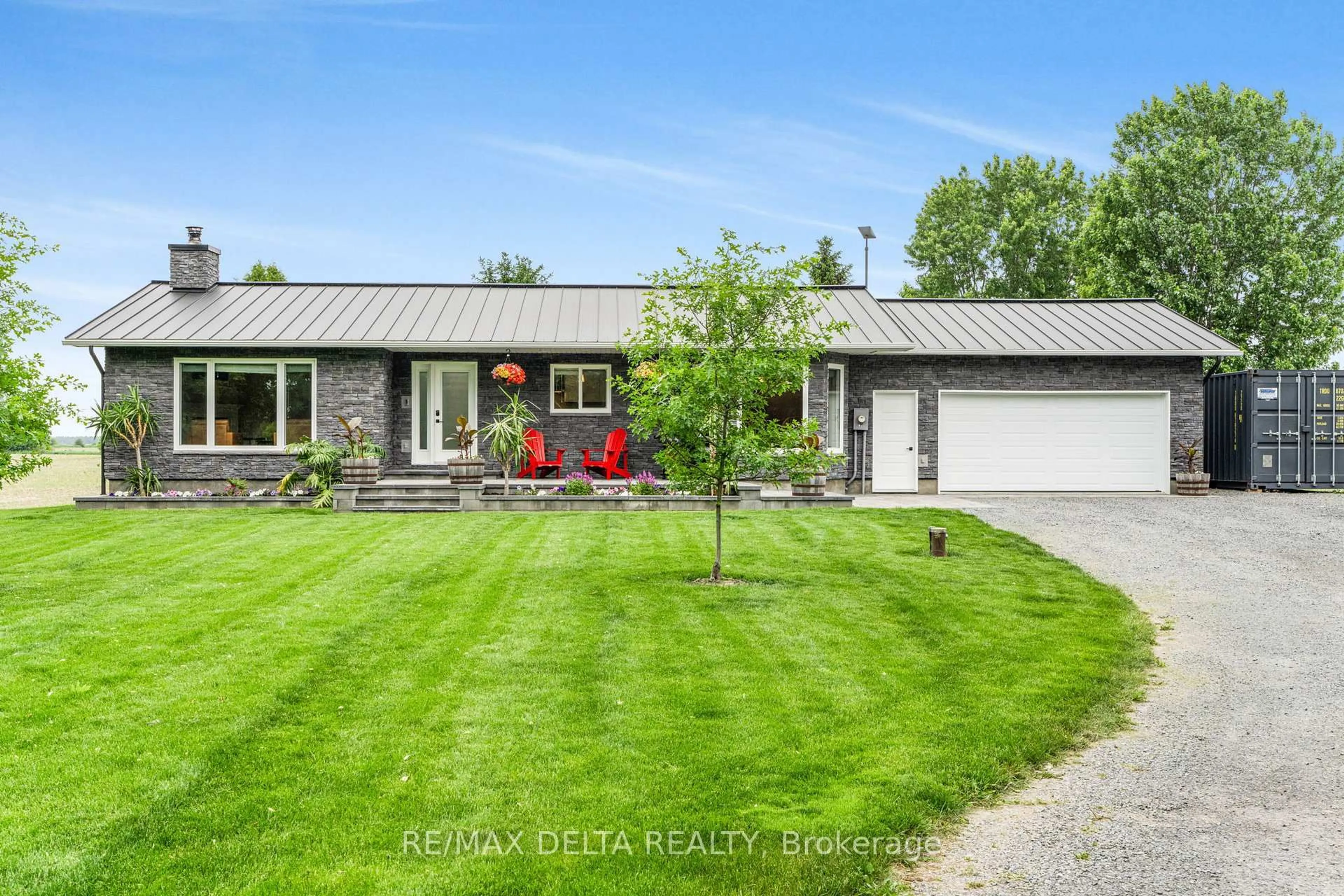 A pic from outside/outdoor area/front of a property/back of a property/a pic from drone, street for 12271 County Rd 5 Rd, North Dundas Ontario K0C 2H0