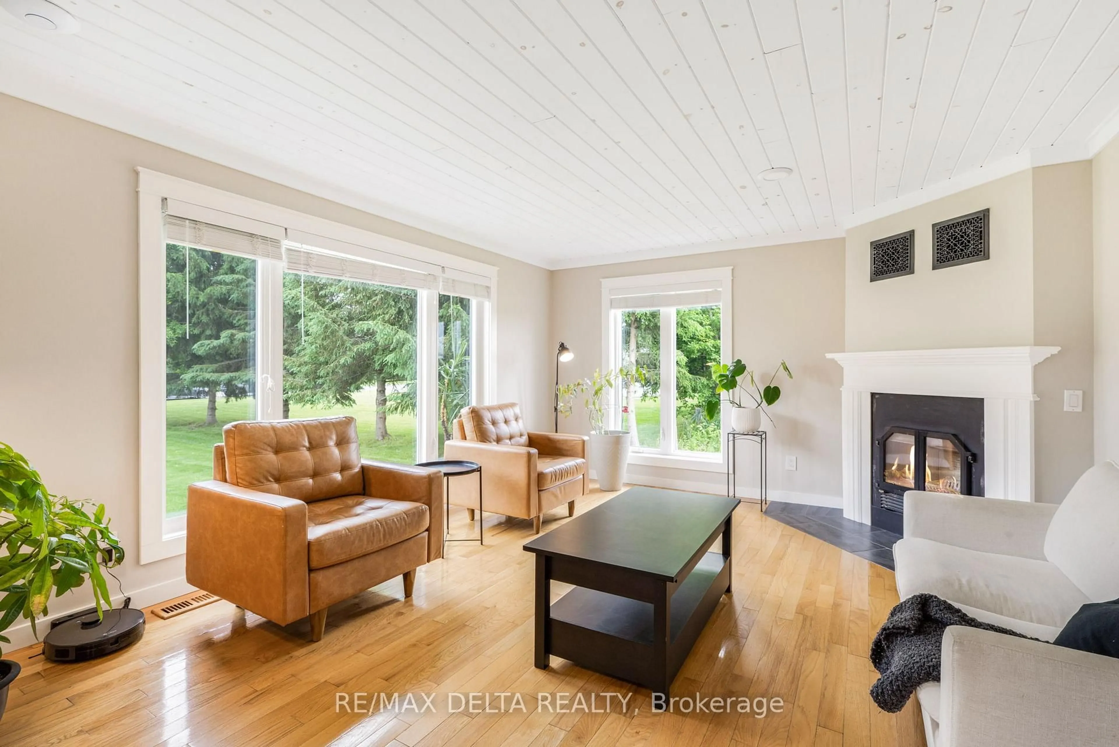 Living room with furniture, wood/laminate floor for 12271 County Rd 5 Rd, North Dundas Ontario K0C 2H0