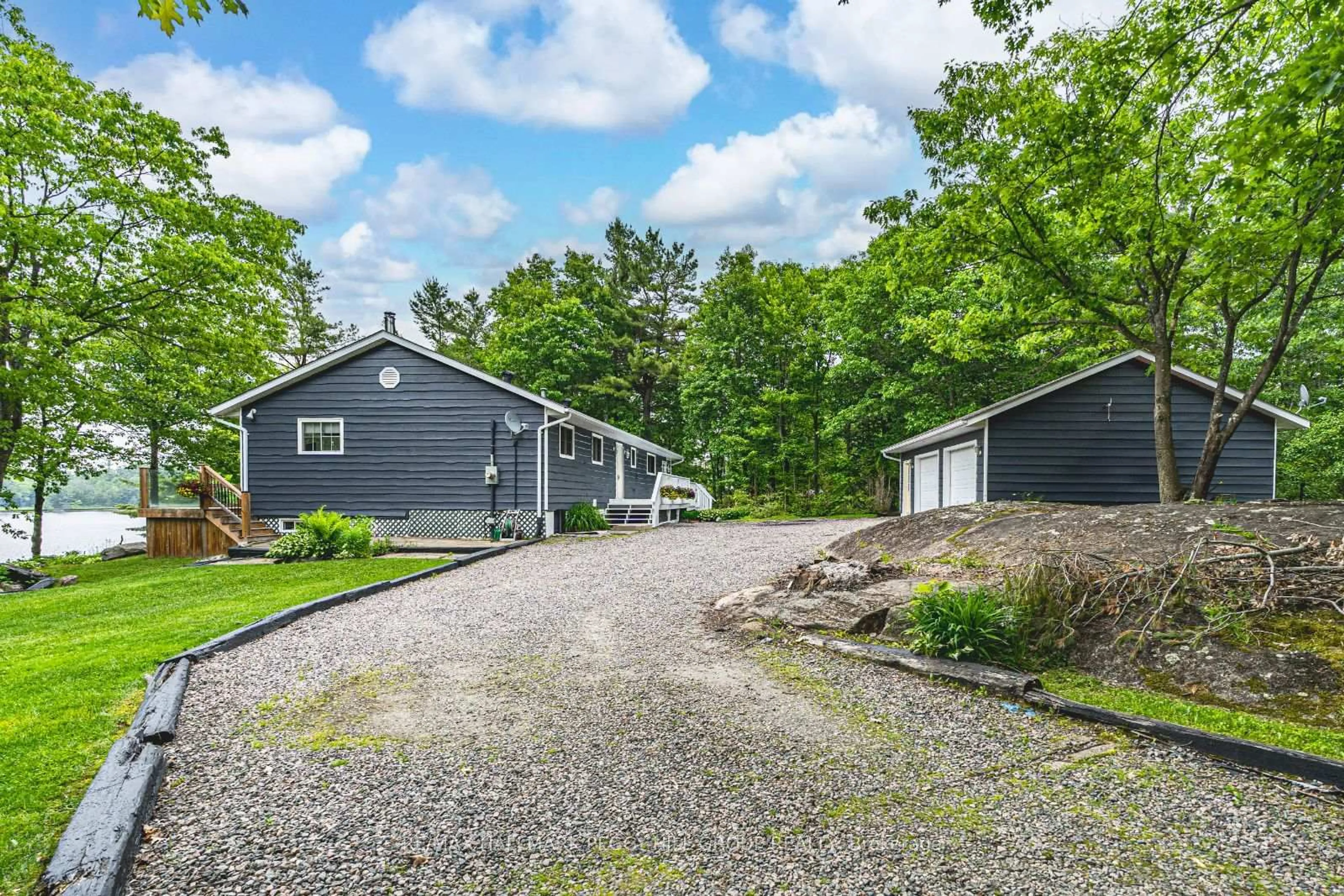 A pic from outside/outdoor area/front of a property/back of a property/a pic from drone, unknown for 1008 Cove Rd, Gravenhurst Ontario P0E 1G0