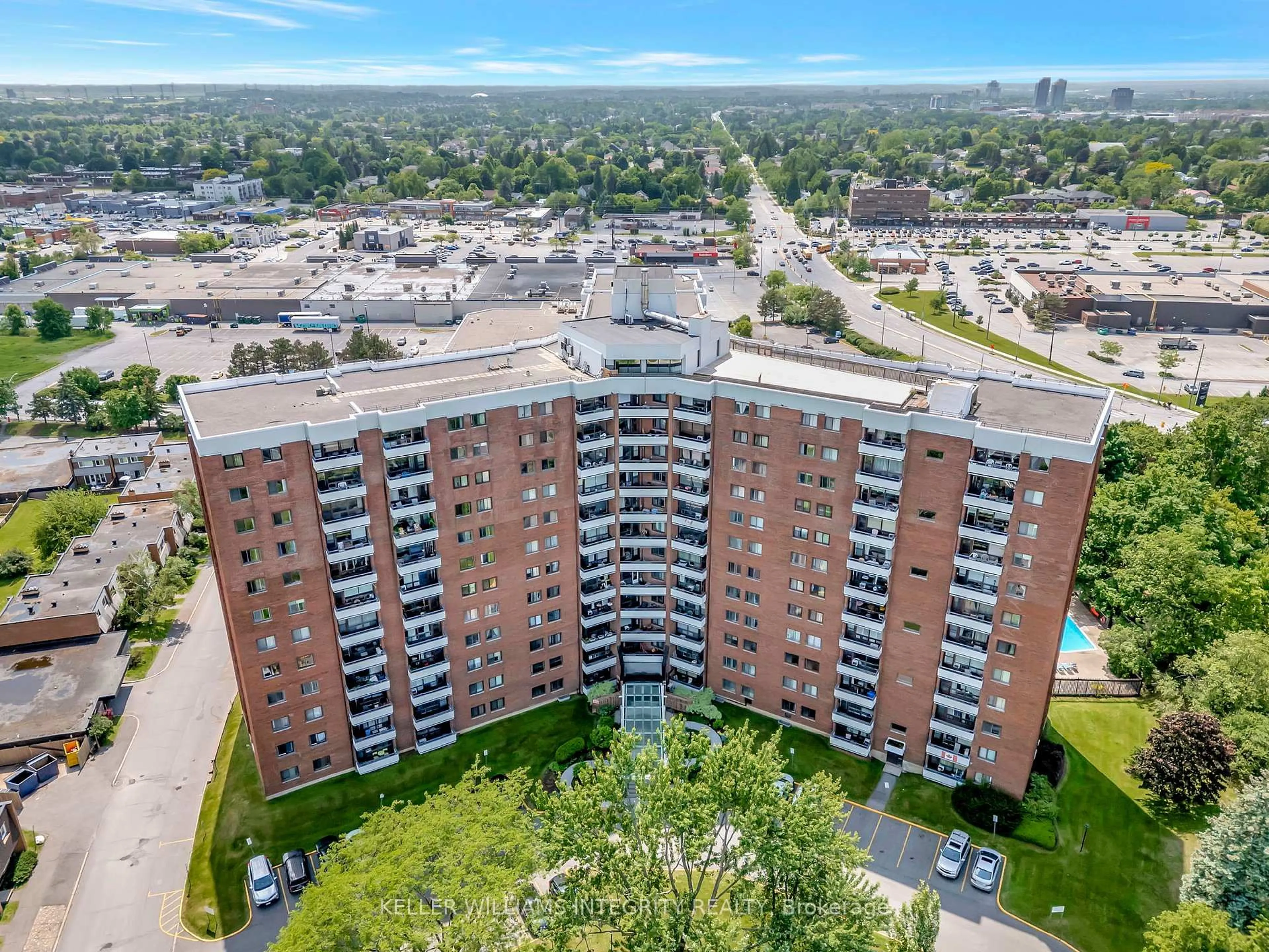 A pic from outside/outdoor area/front of a property/back of a property/a pic from drone, city buildings view from balcony for 20 Chesterton Dr #504, Ottawa Ontario K2E 6Z7