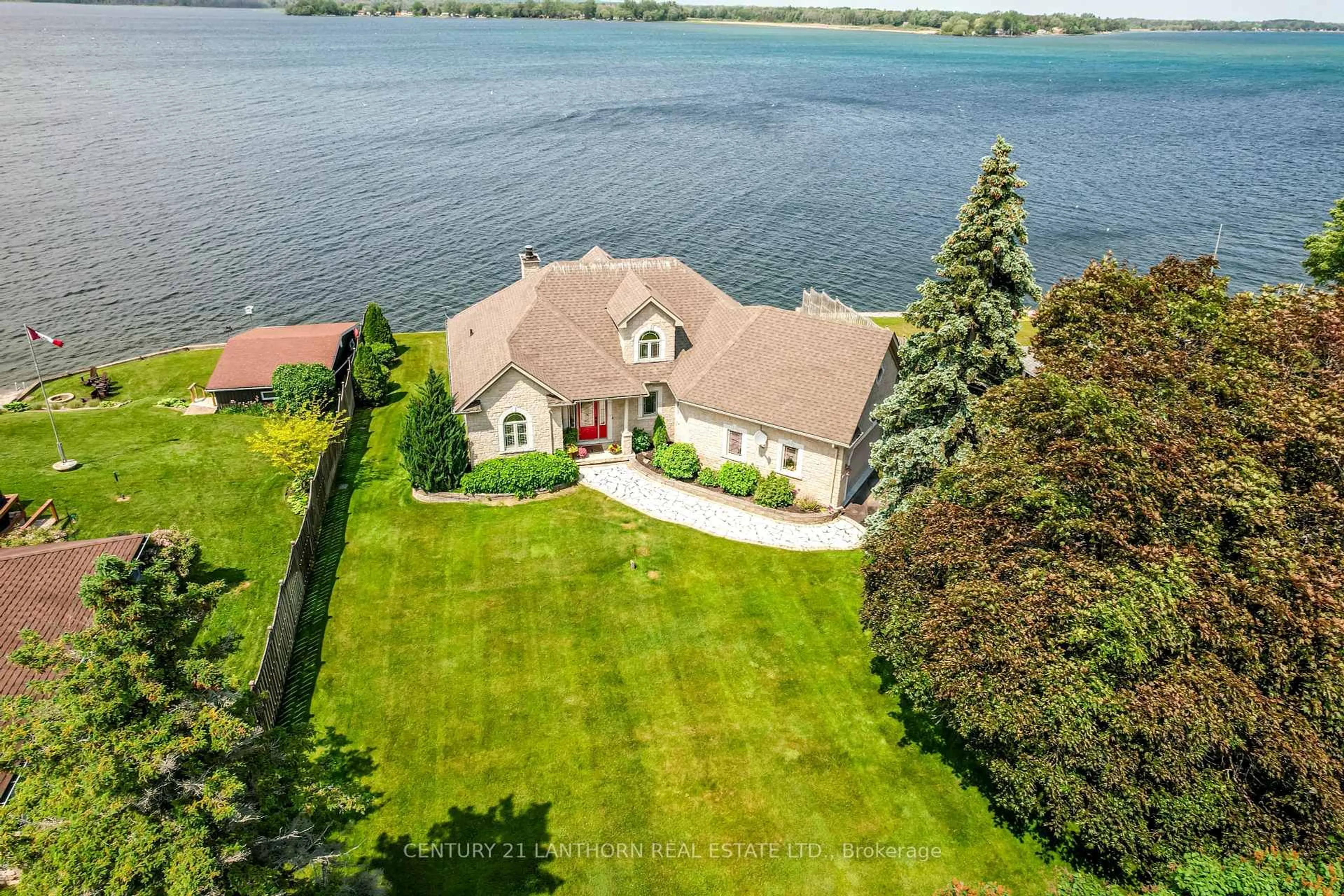 A pic from outside/outdoor area/front of a property/back of a property/a pic from drone, water/lake/river/ocean view for 54 Bayshore Rd, Brighton Ontario K0K 1H0