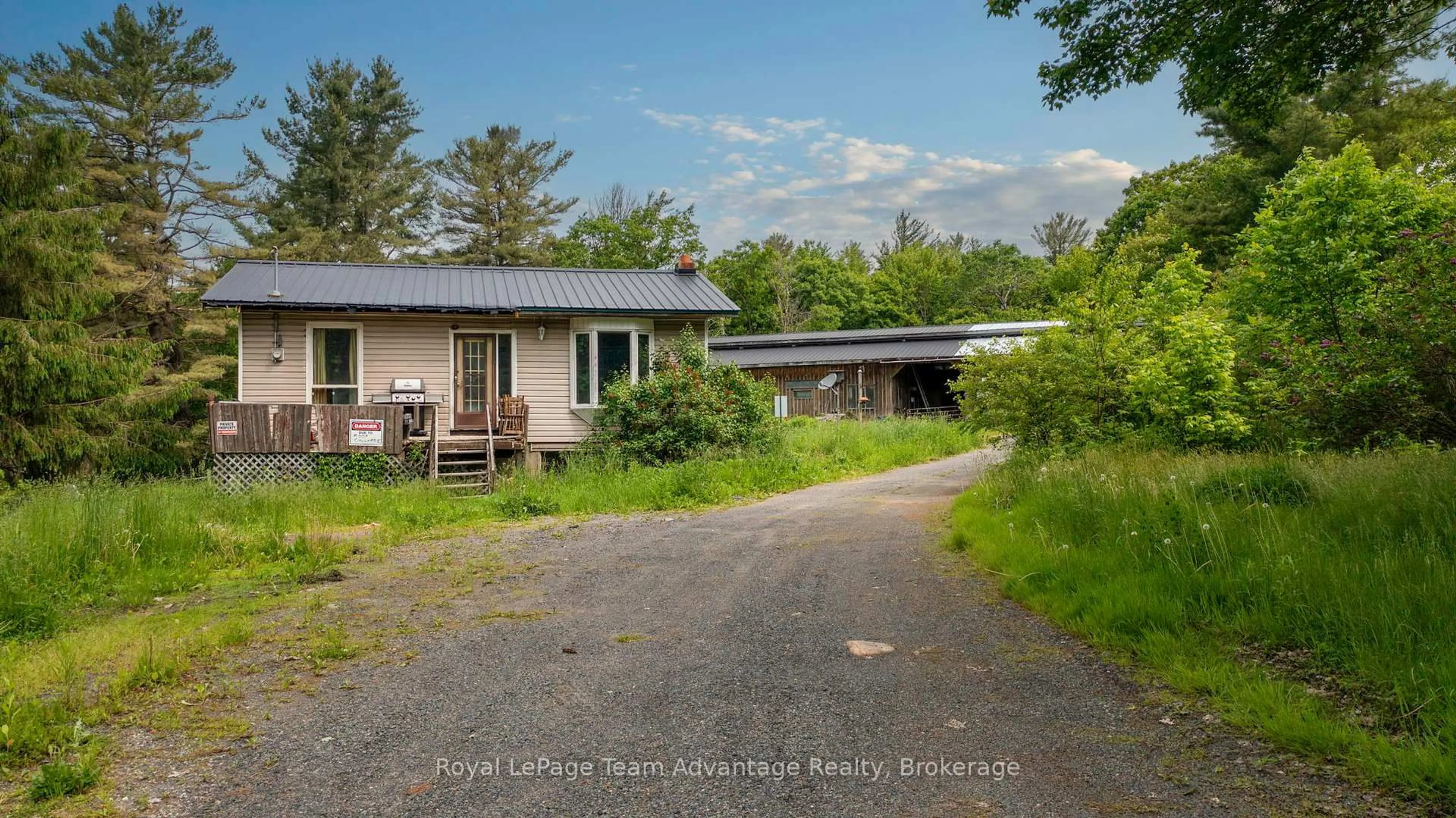 A pic from outside/outdoor area/front of a property/back of a property/a pic from drone, unknown for 198 518 Highway, Seguin Ontario P2A 0B2