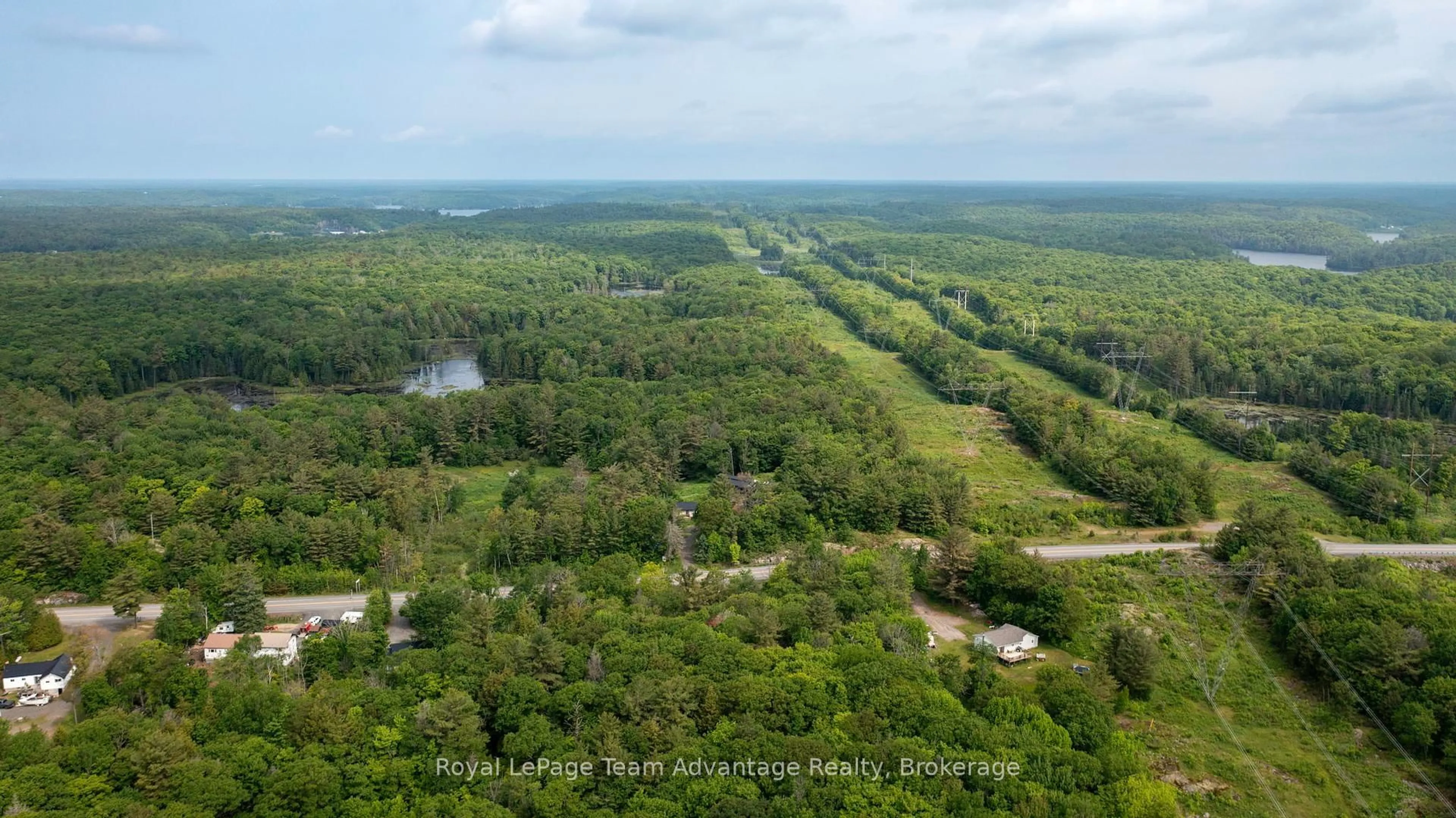 A pic from outside/outdoor area/front of a property/back of a property/a pic from drone, forest/trees view for 198 518 Highway, Seguin Ontario P2A 0B2