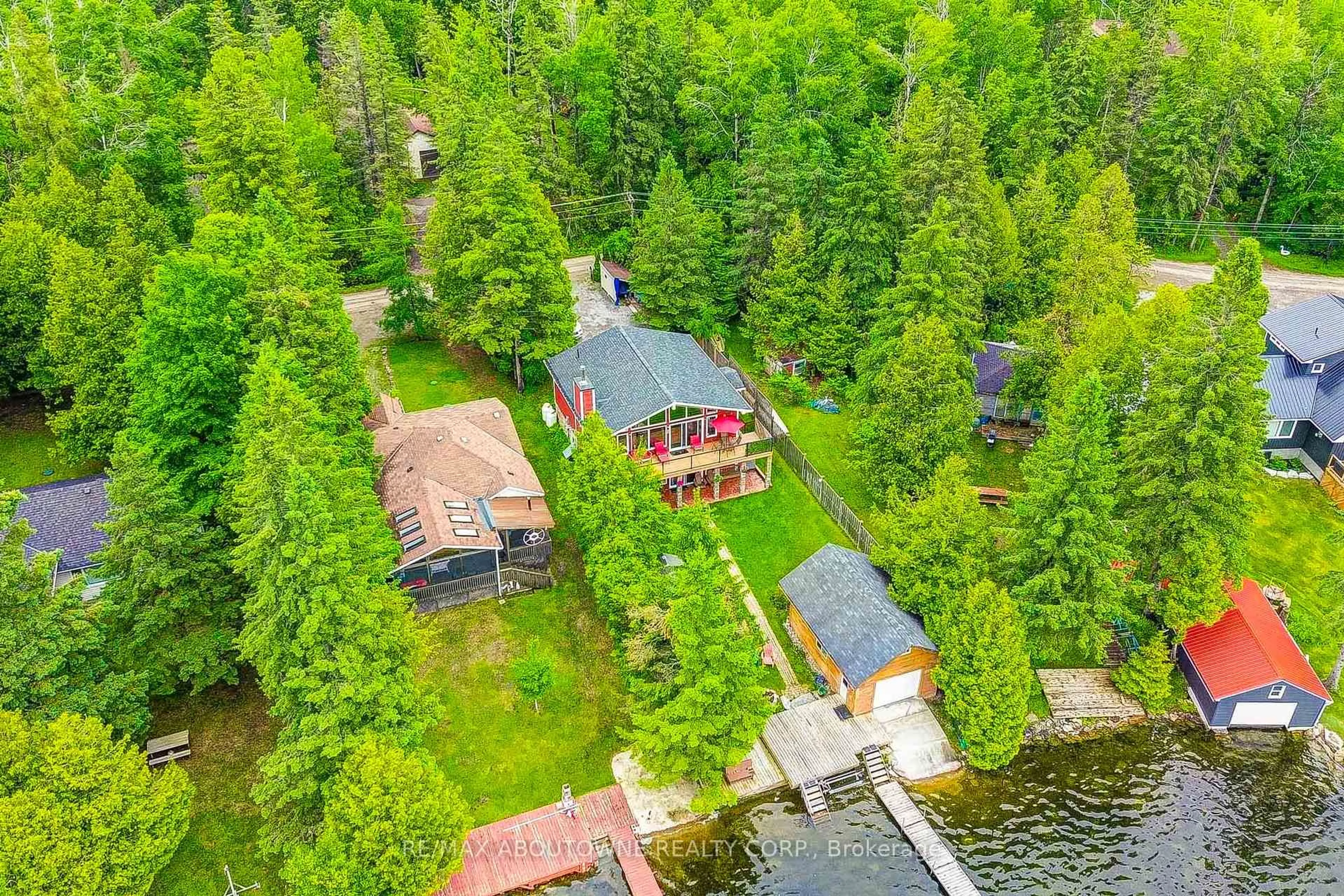 A pic from outside/outdoor area/front of a property/back of a property/a pic from drone, water/lake/river/ocean view for 87 Paradise Rd, Kawartha Lakes Ontario K0M 1B0