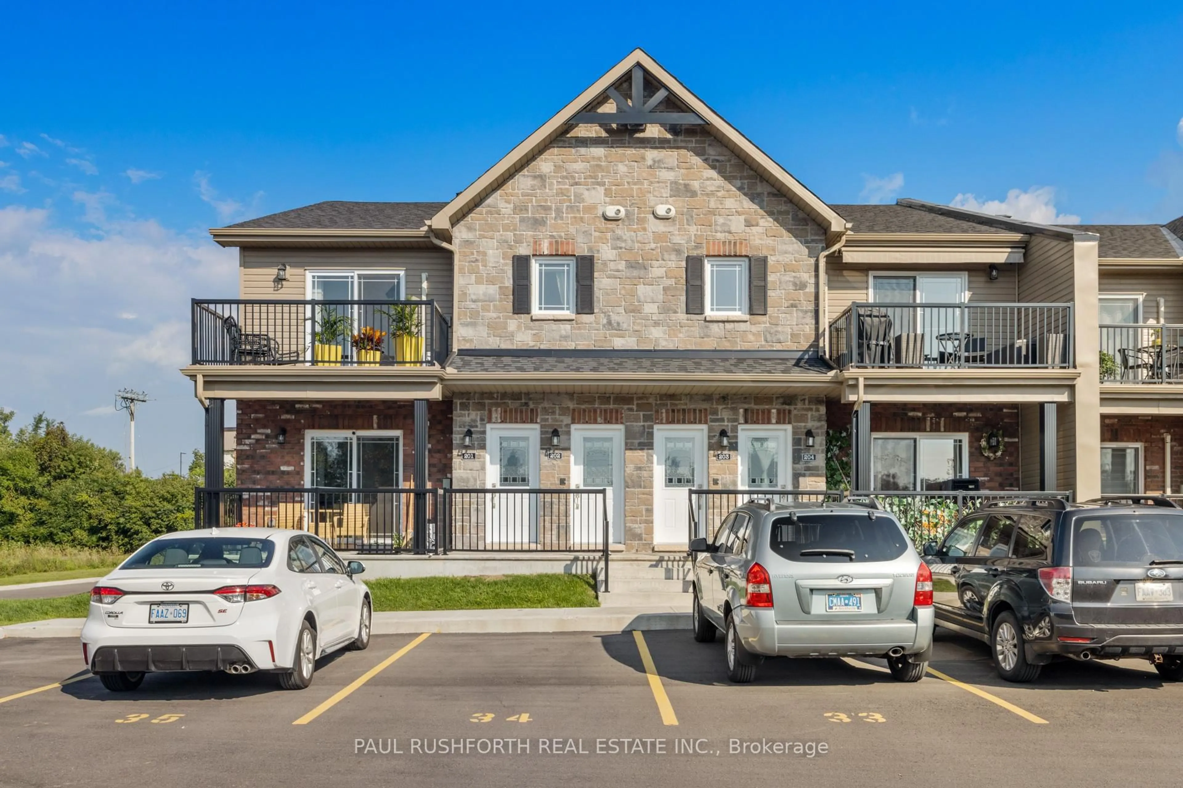 Home with brick exterior material, street for 330 Montee Outaouais St #406, Clarence-Rockland Ontario K4K 1G2