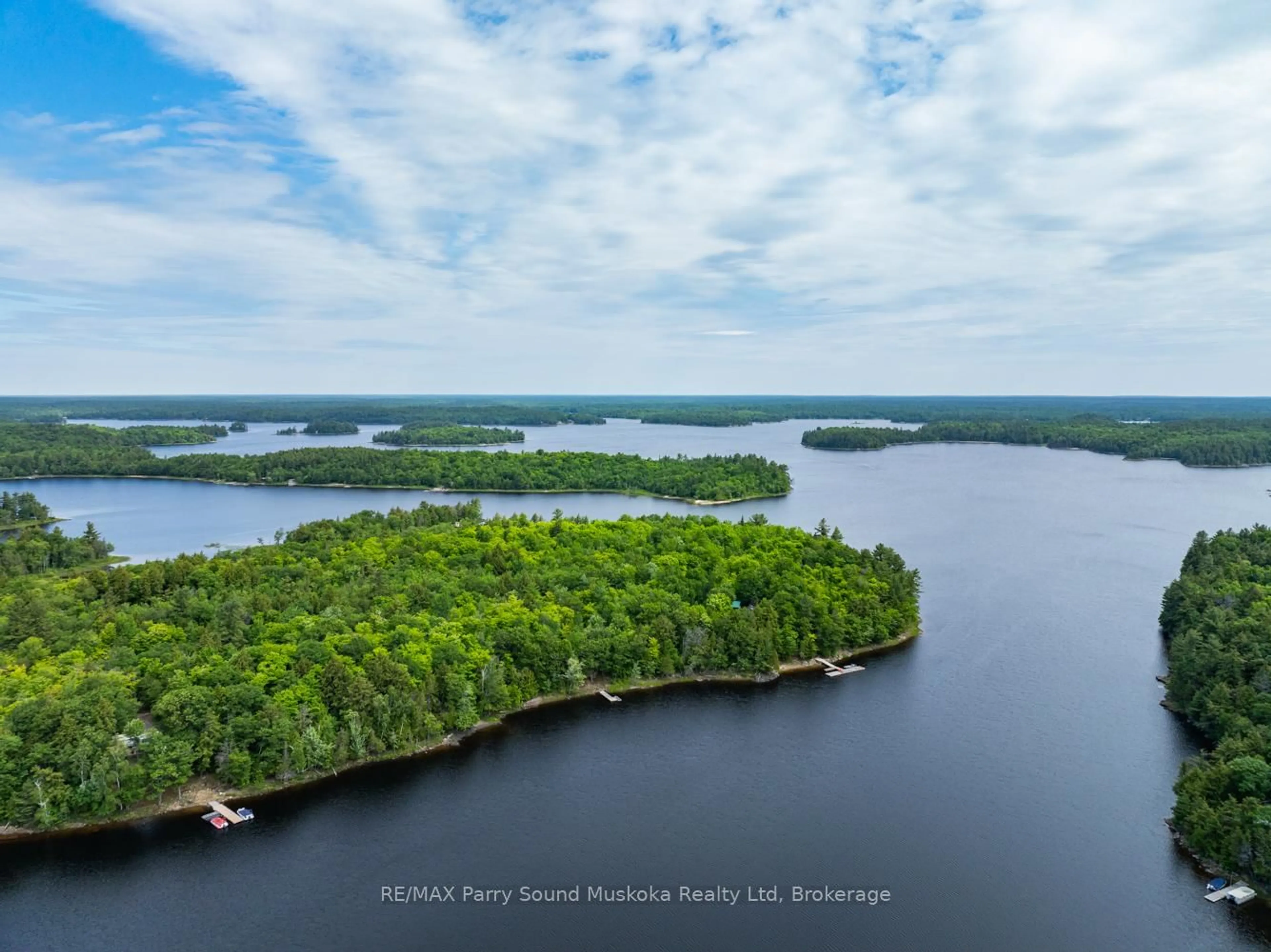 A pic from outside/outdoor area/front of a property/back of a property/a pic from drone, water/lake/river/ocean view for 3 Macey Dr, Whitestone Ontario P0A 1G0