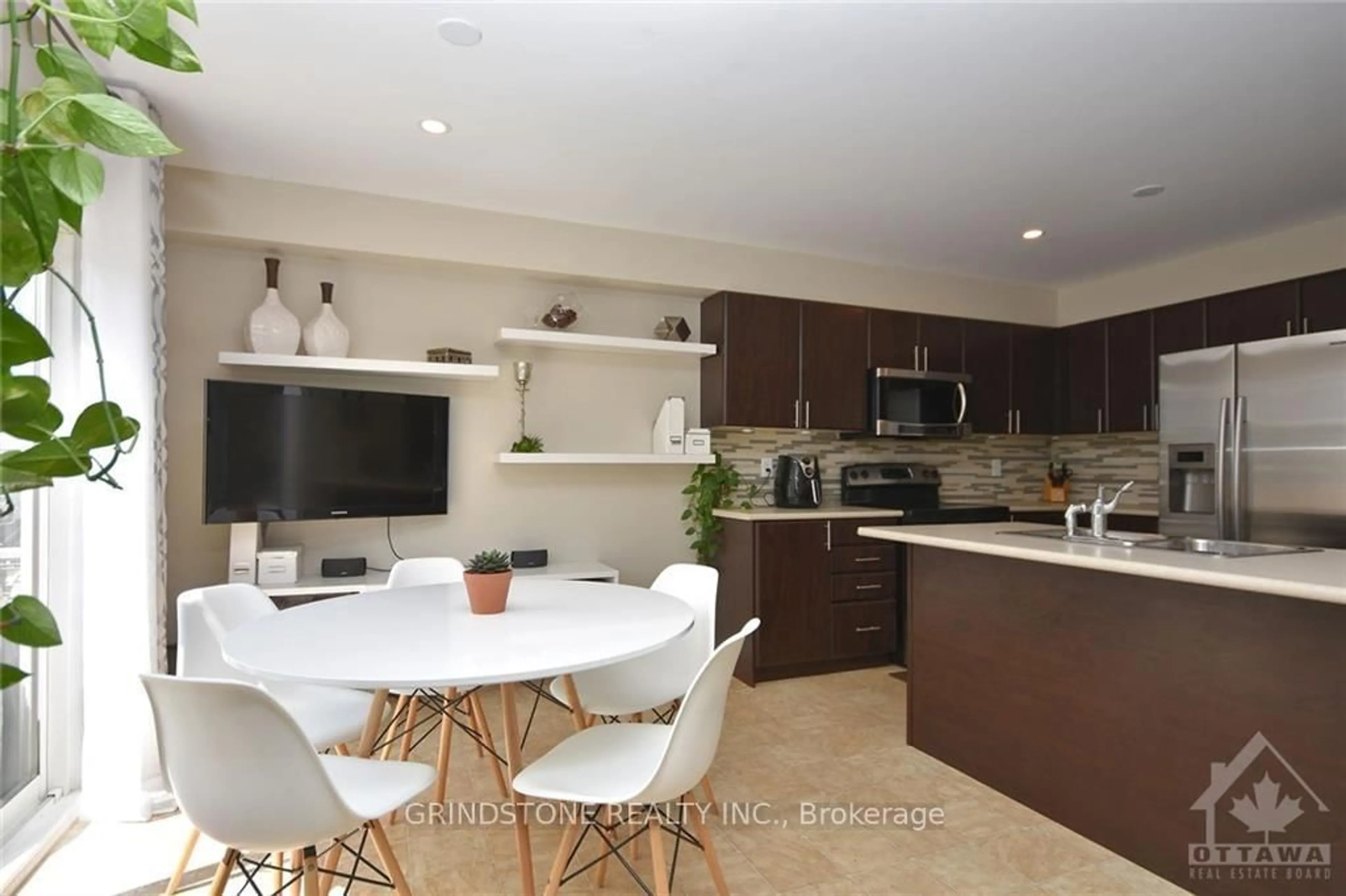 Open concept kitchen, ceramic/tile floor for 2414 NUTGROVE Ave, Ottawa Ontario K2J 0W9