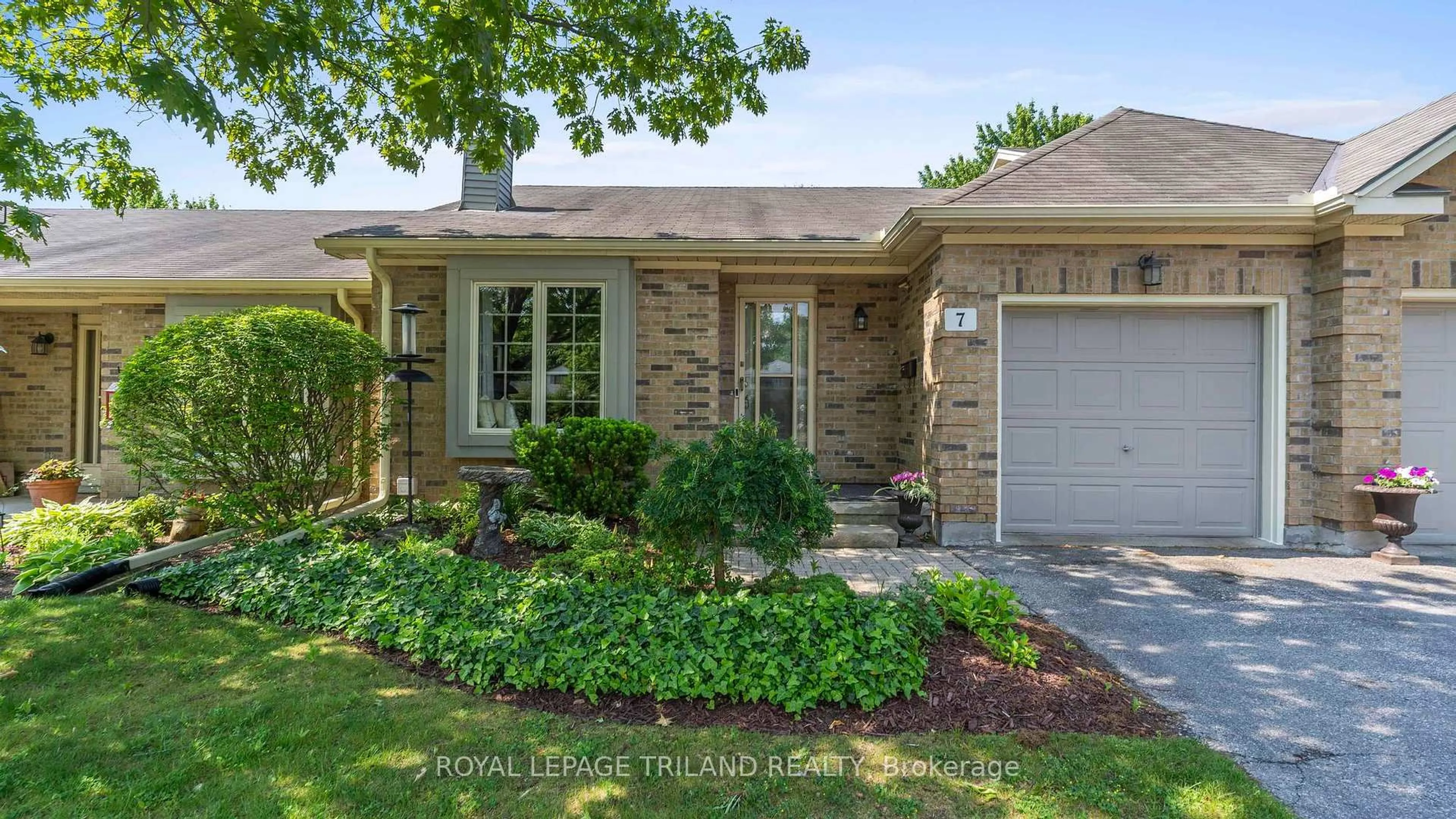 Home with brick exterior material, street for 1241 Hamilton Rd #7, London East Ontario N5W 6B3