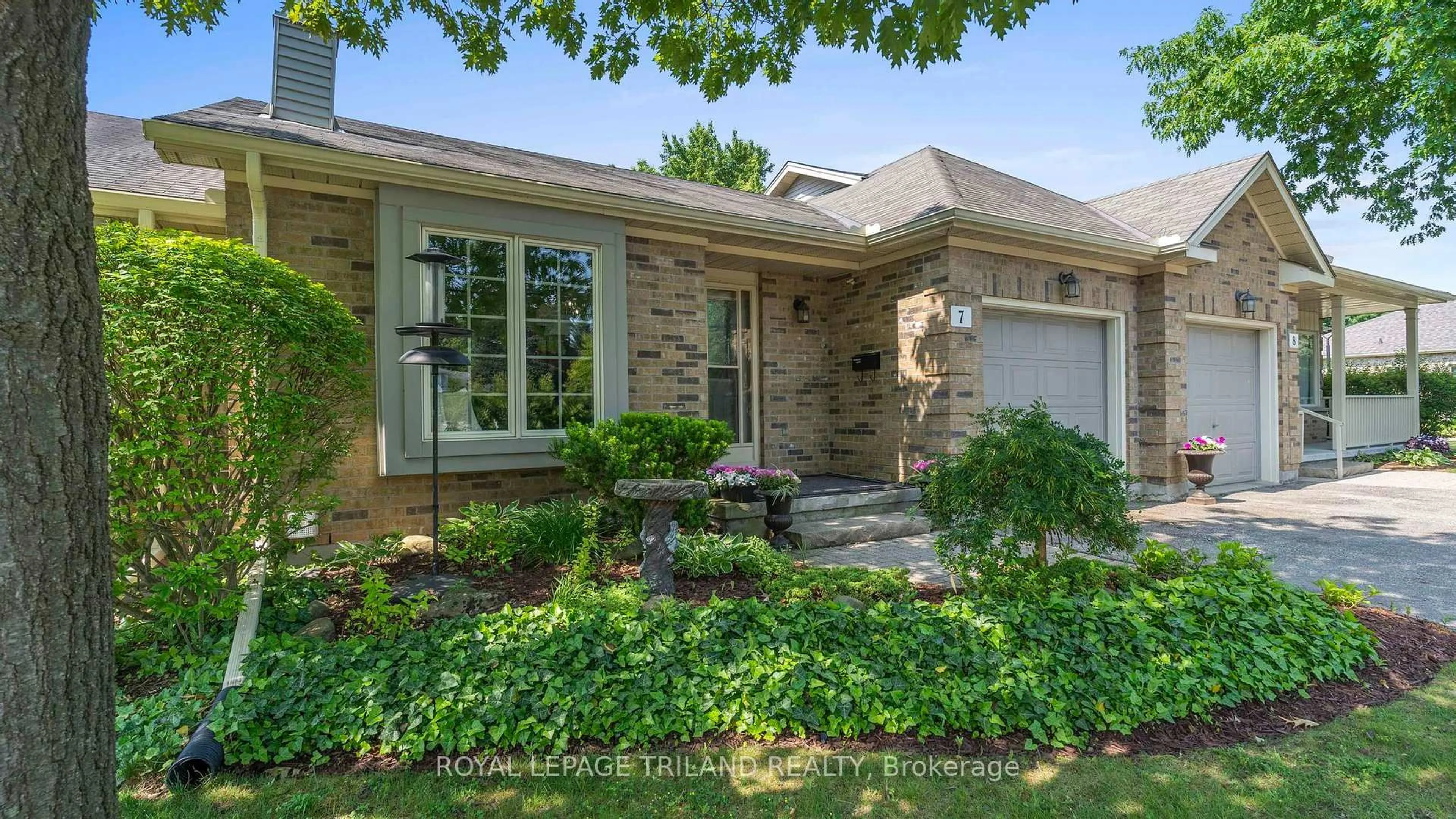 Home with brick exterior material, street for 1241 Hamilton Rd #7, London East Ontario N5W 6B3