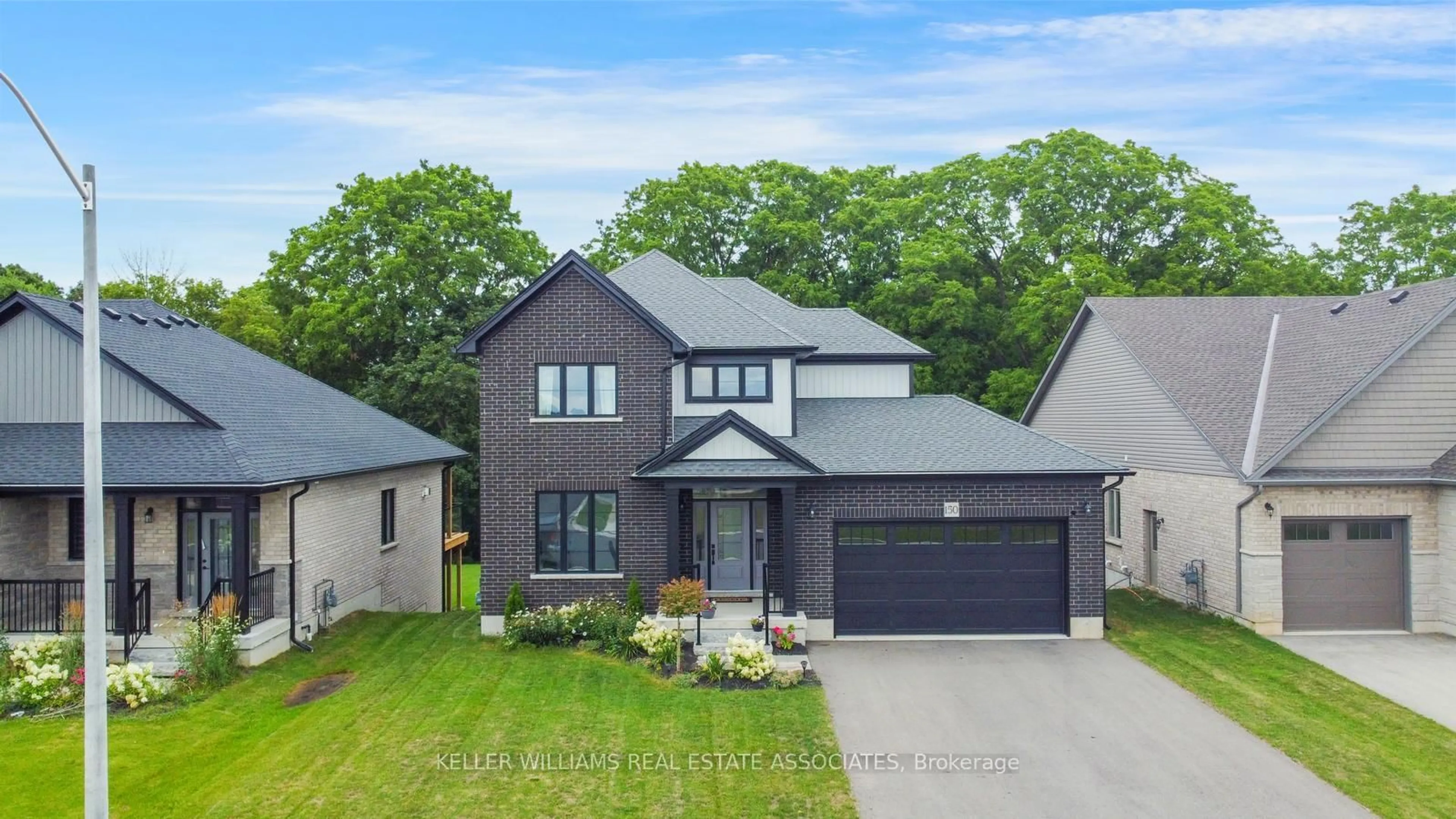 A pic from outside/outdoor area/front of a property/back of a property/a pic from drone, street for 150 Eccles Ave, West Grey Ontario N0G 1R0