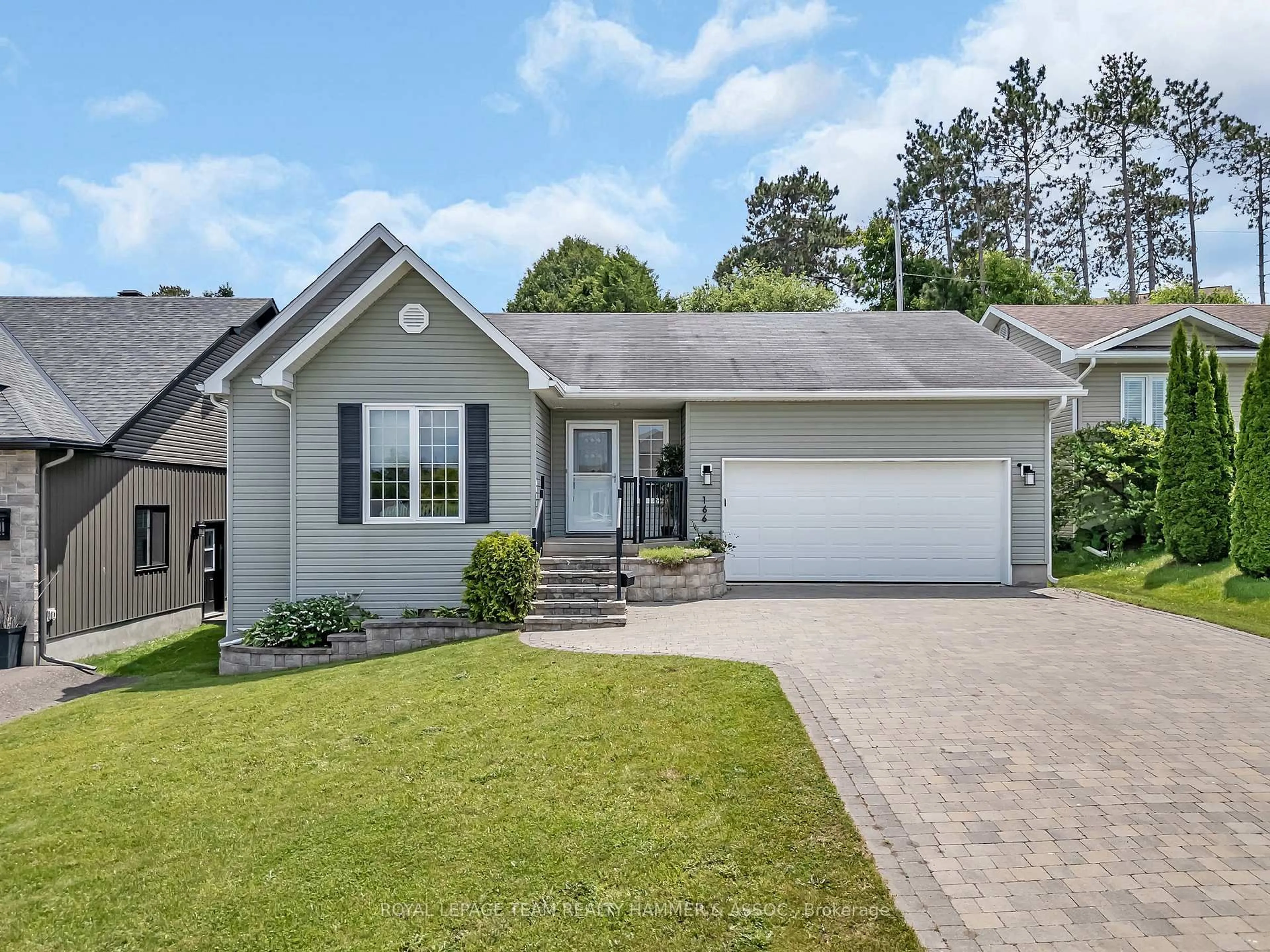 Home with vinyl exterior material, street for 166 Haramis Dr, Renfrew Ontario K7V 4M8