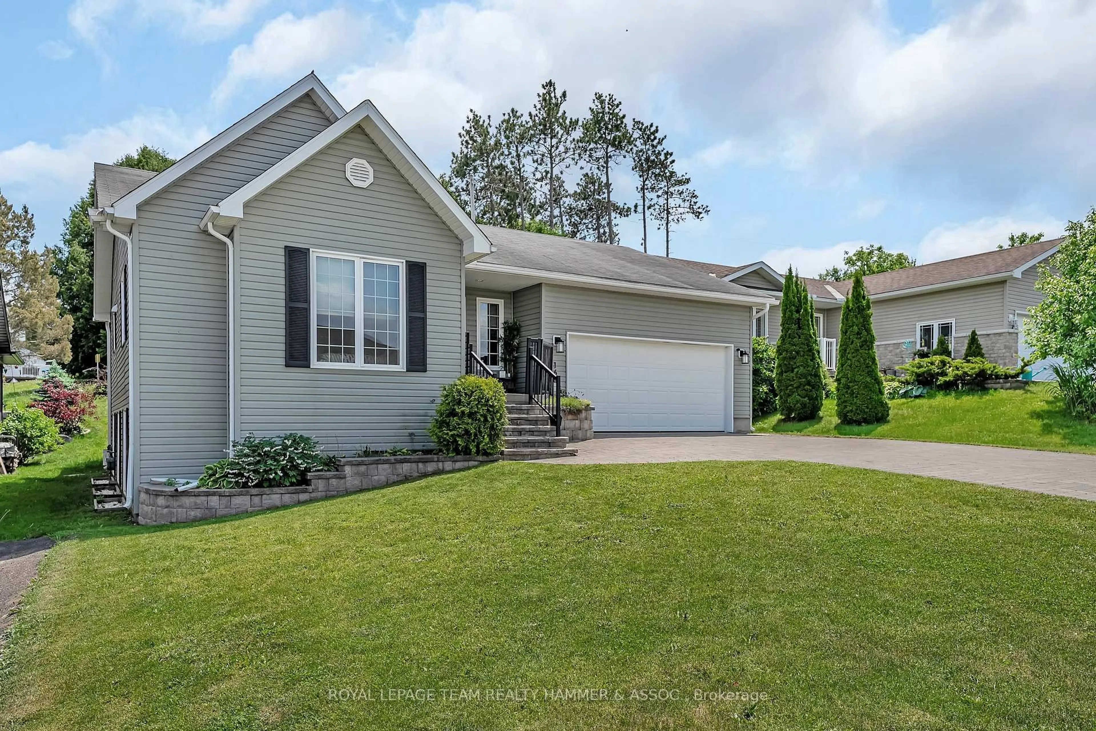 Home with vinyl exterior material, street for 166 Haramis Dr, Renfrew Ontario K7V 4M8