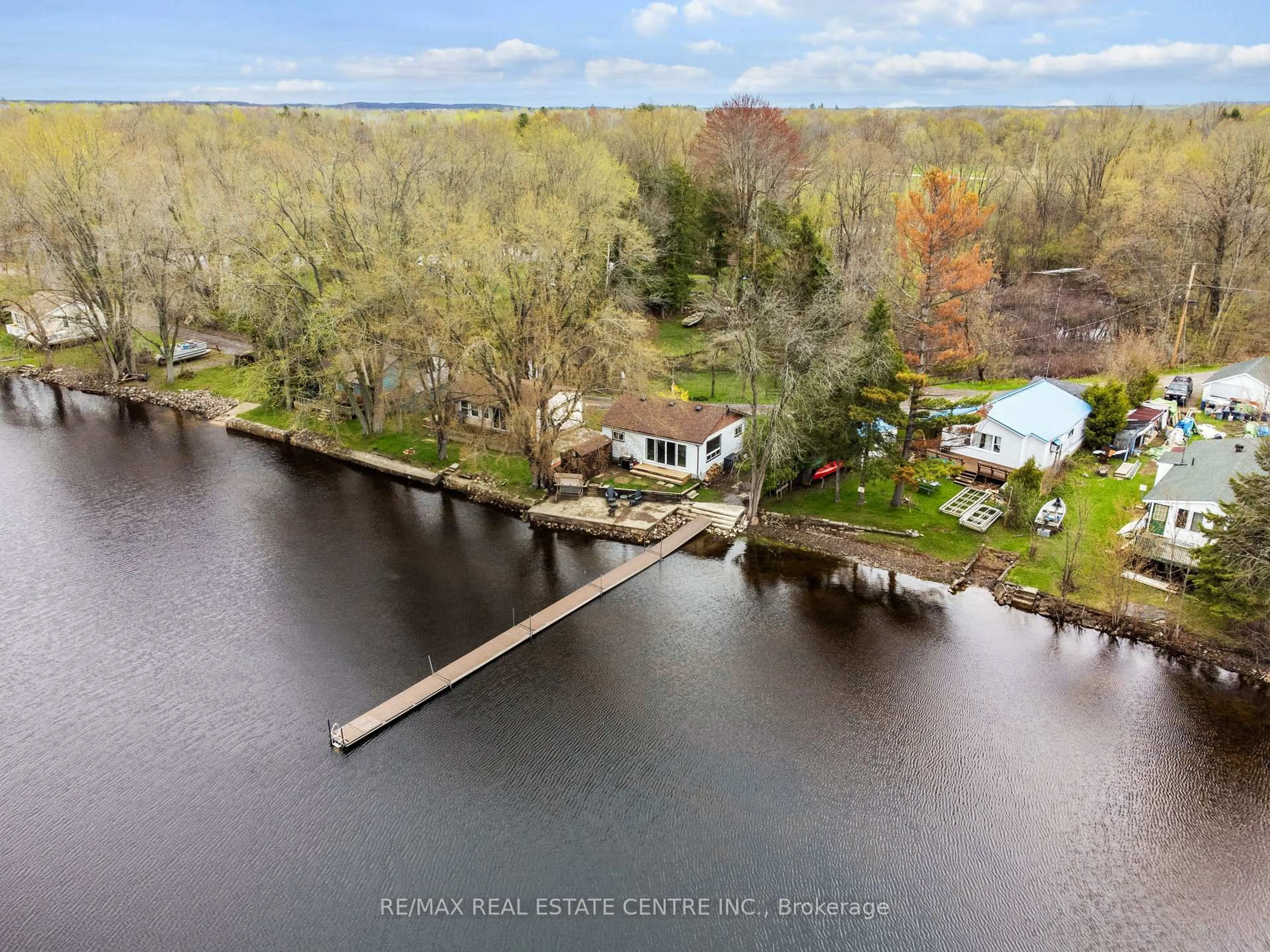 A pic from outside/outdoor area/front of a property/back of a property/a pic from drone, water/lake/river/ocean view for 105 Hughes Lane, Tweed Ontario K0K 3J0