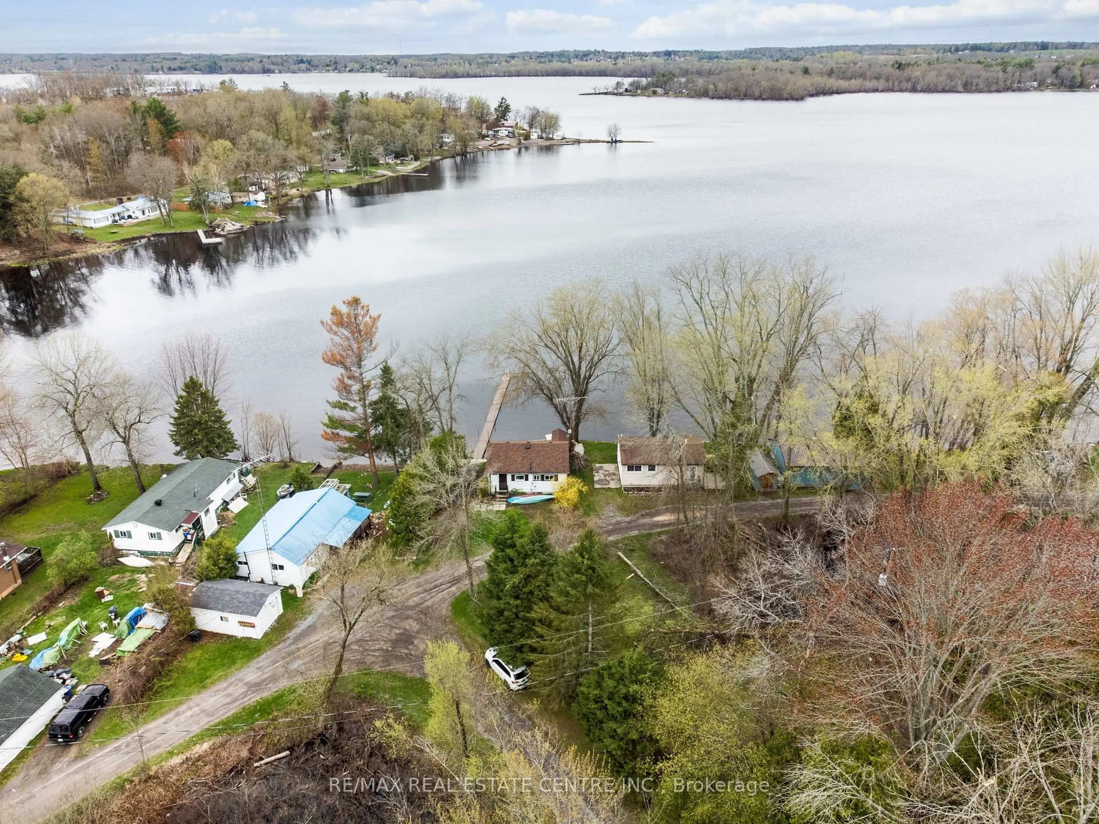 A pic from outside/outdoor area/front of a property/back of a property/a pic from drone, water/lake/river/ocean view for 105 Hughes Lane, Tweed Ontario K0K 3J0