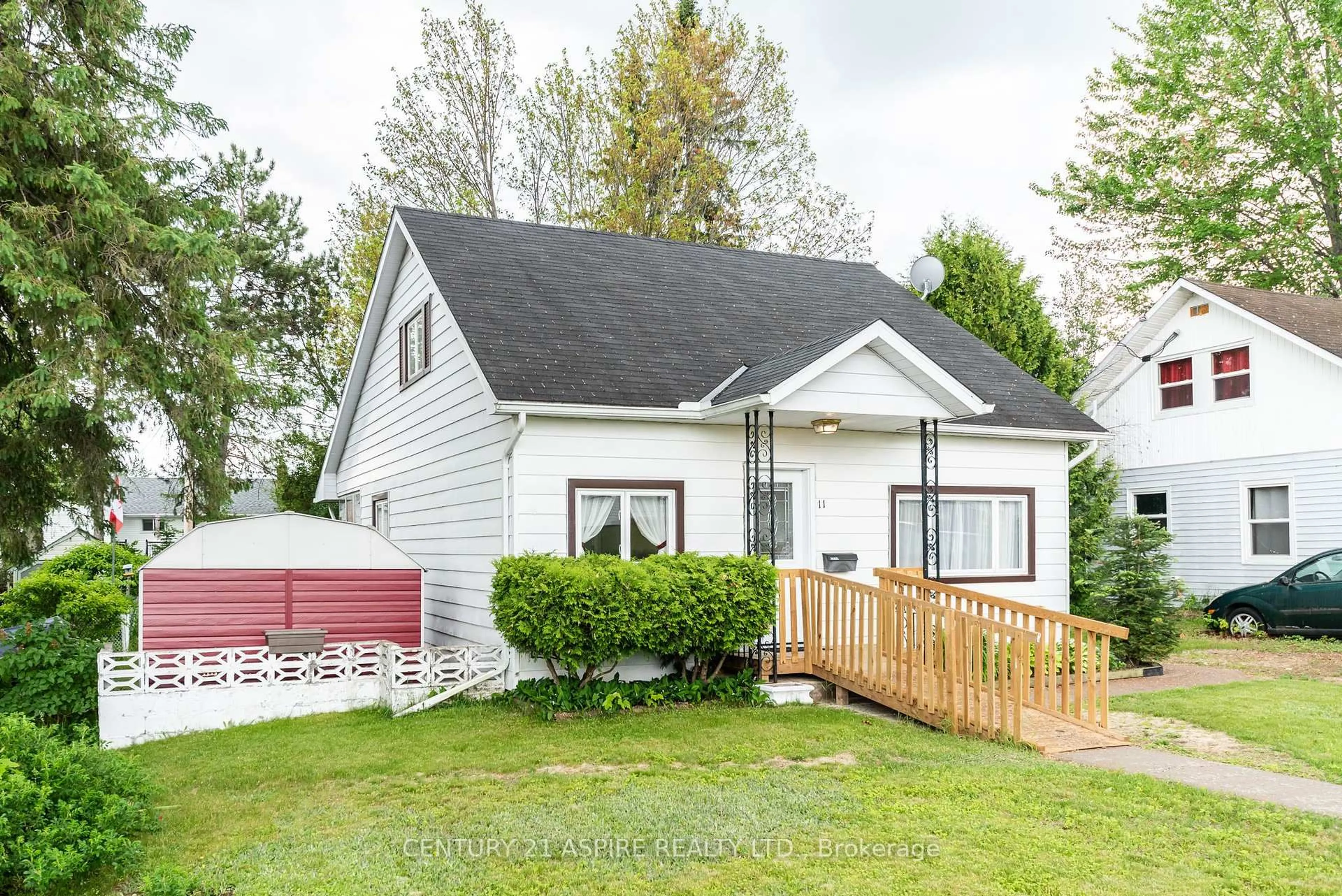 Home with vinyl exterior material, street for 11 Troyes St, Deep River Ontario K0J 1P0