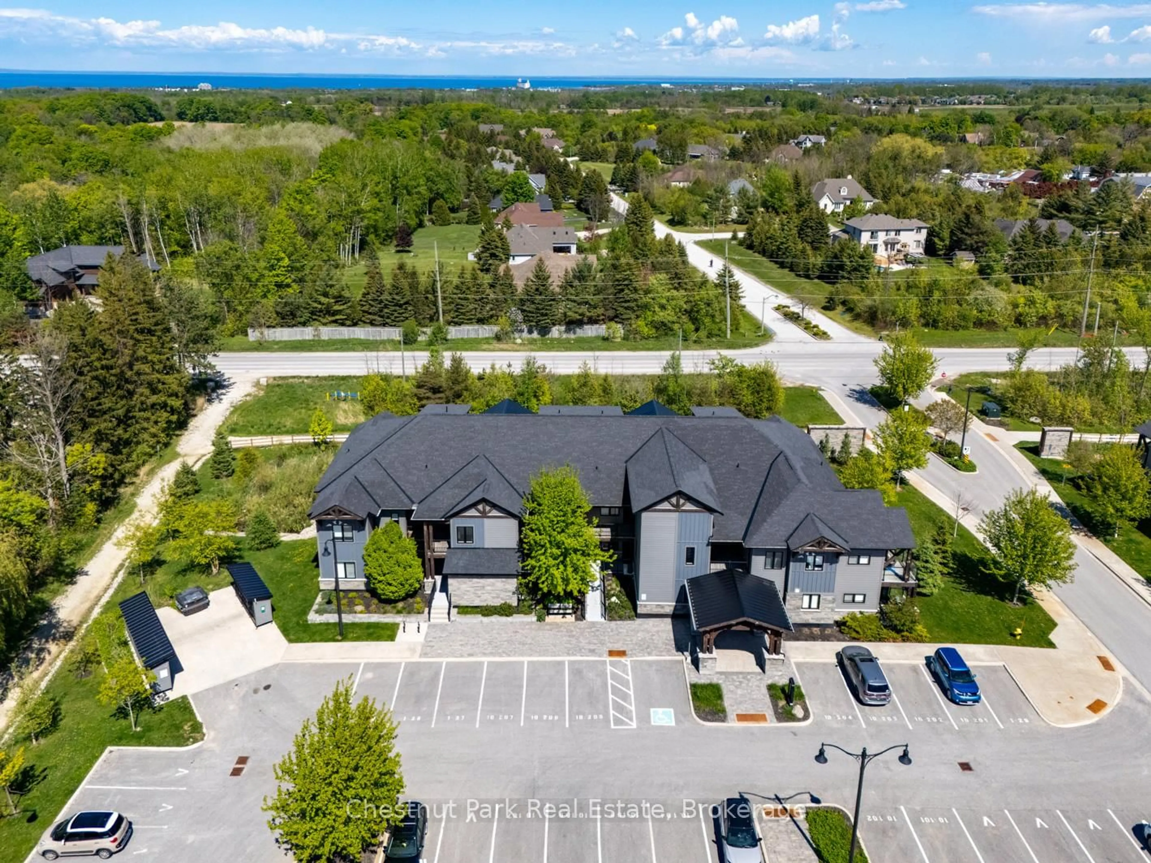 A pic from outside/outdoor area/front of a property/back of a property/a pic from drone, street for 10 Beckwith Lane #106, Blue Mountains Ontario L9Y 0A4