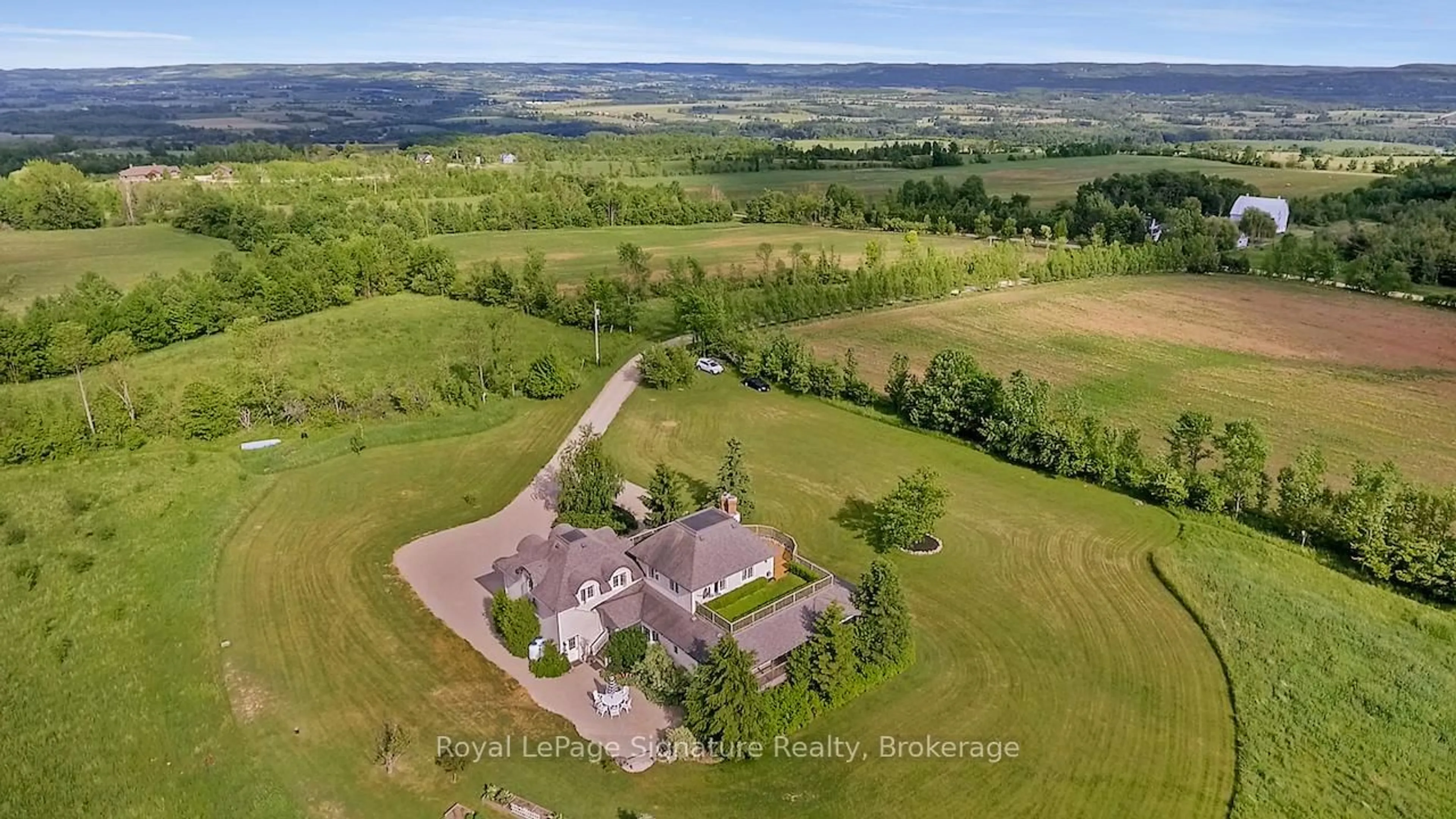A pic from outside/outdoor area/front of a property/back of a property/a pic from drone, unknown for 807035 25th Side Rd, Grey Highlands Ontario N0C 1G0
