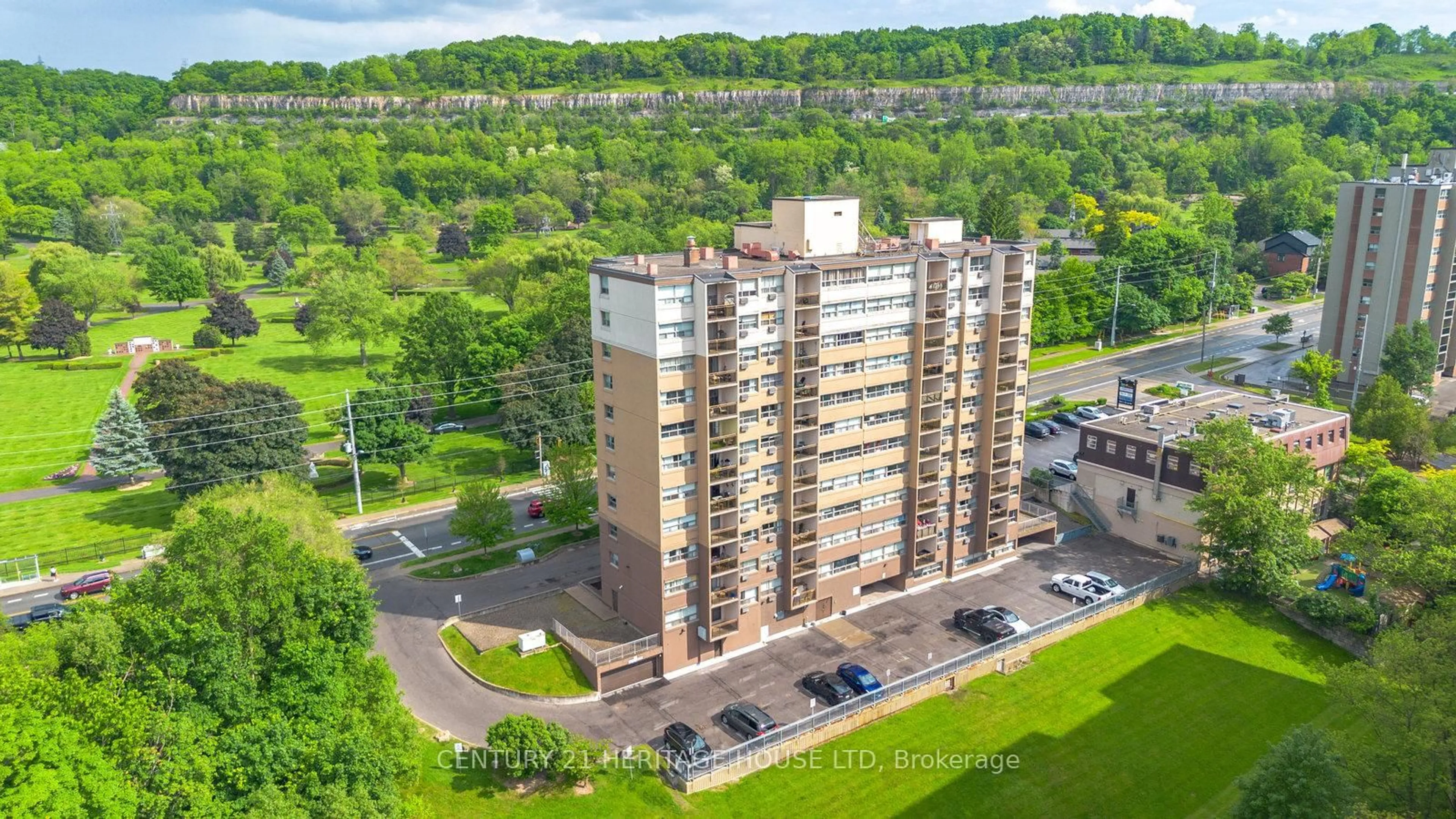A pic from outside/outdoor area/front of a property/back of a property/a pic from drone, building for 1950 Main St #408, Hamilton Ontario L8S 4M9