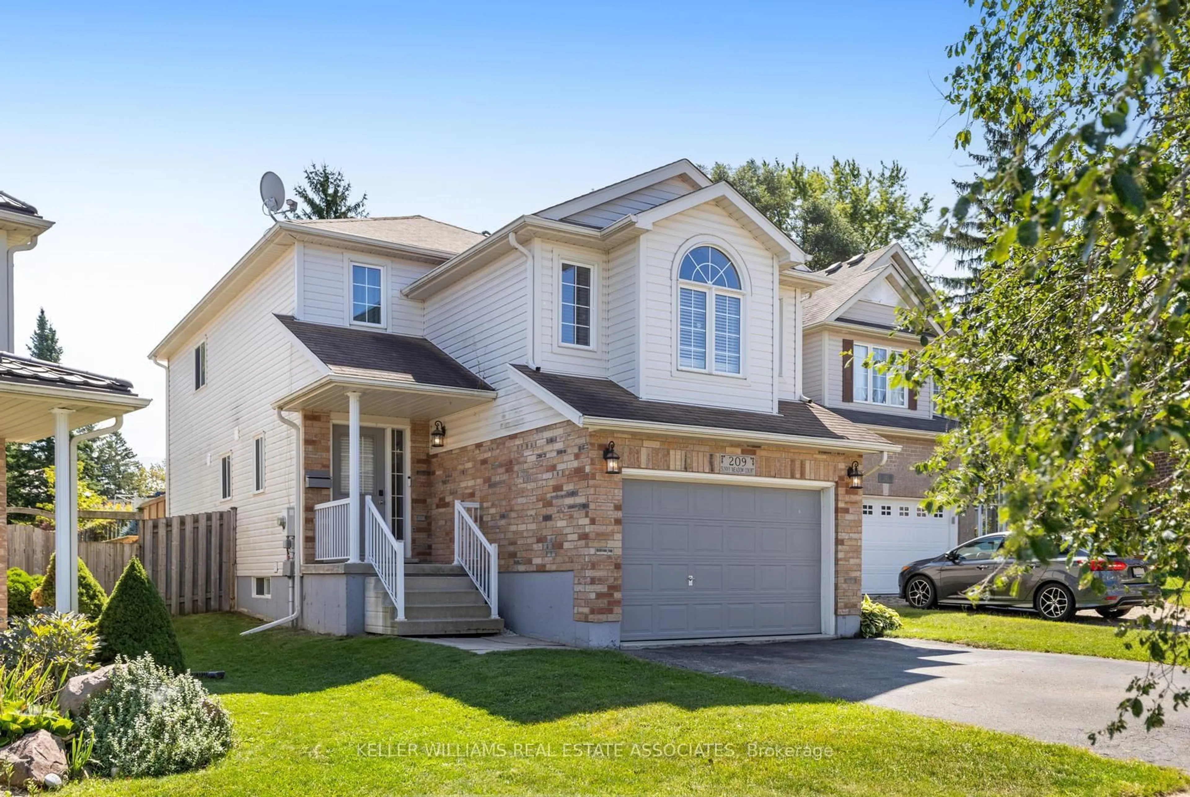 Home with vinyl exterior material, street for 209 Sunny Meadow Crt, Kitchener Ontario N2N 3R3