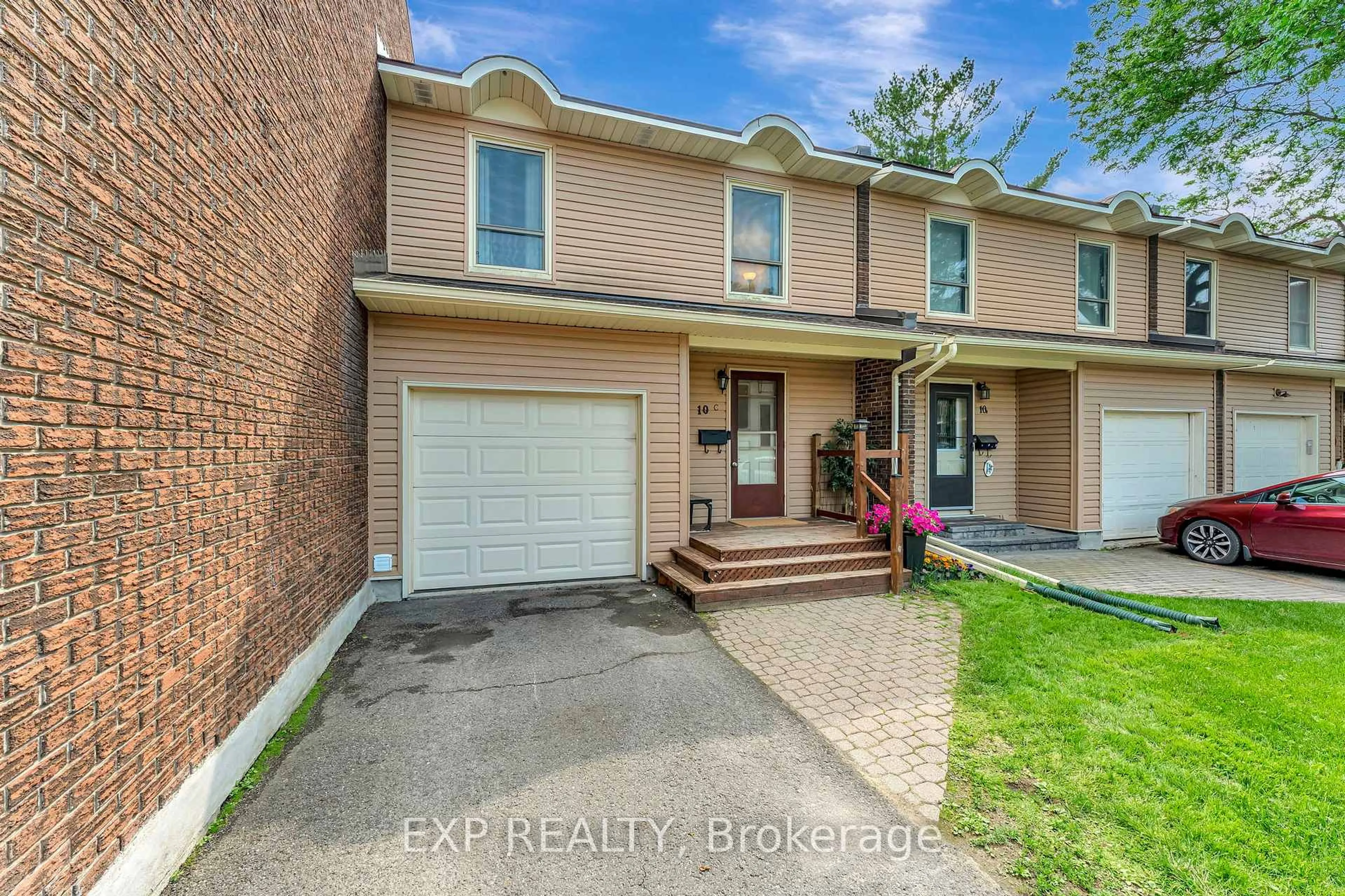 Home with brick exterior material, street for 10 Arnold Dr #C, Ottawa Ontario K2H 6V9