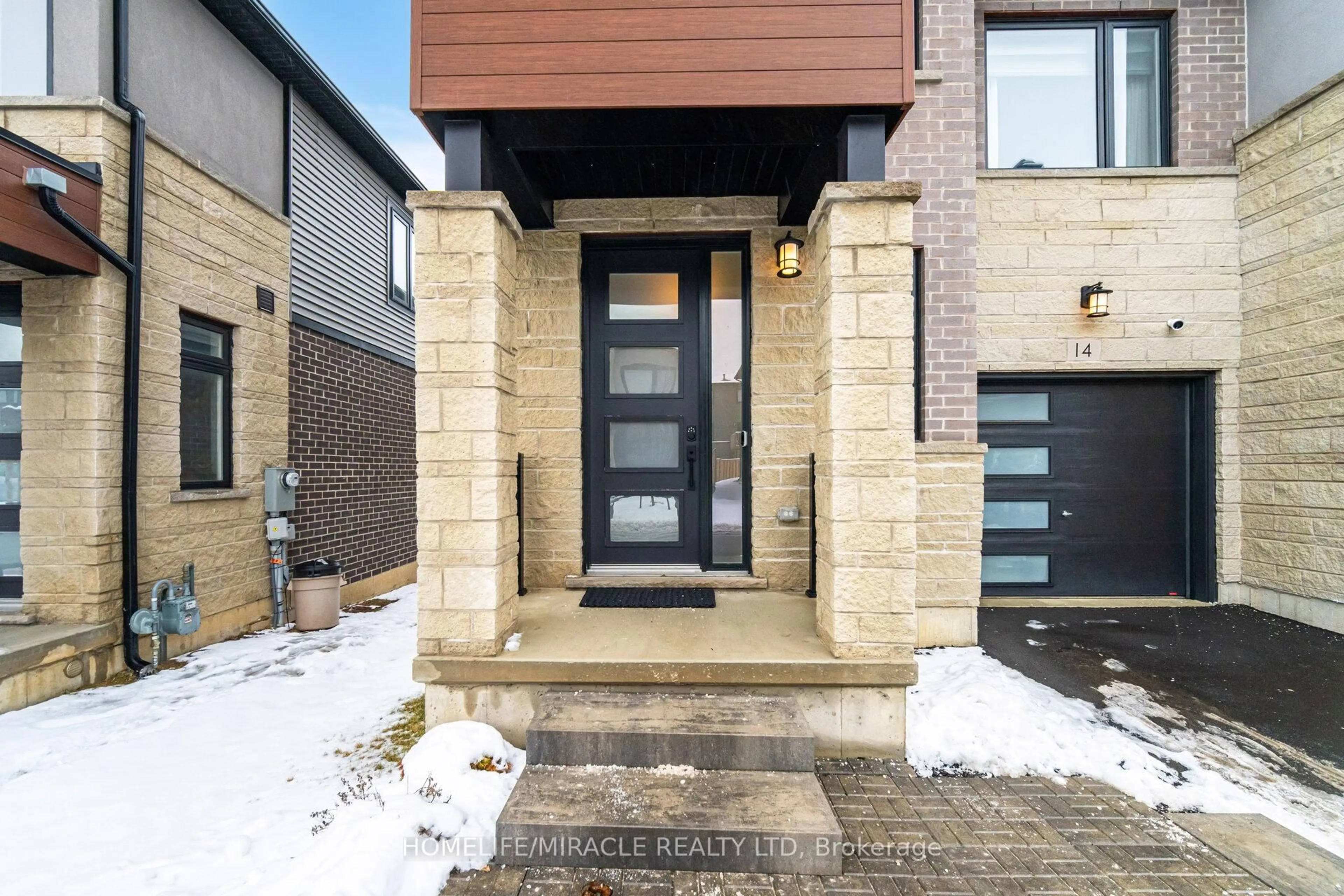 Home with brick exterior material, street for 14 Southam Lane, Hamilton Ontario L9C 0E9