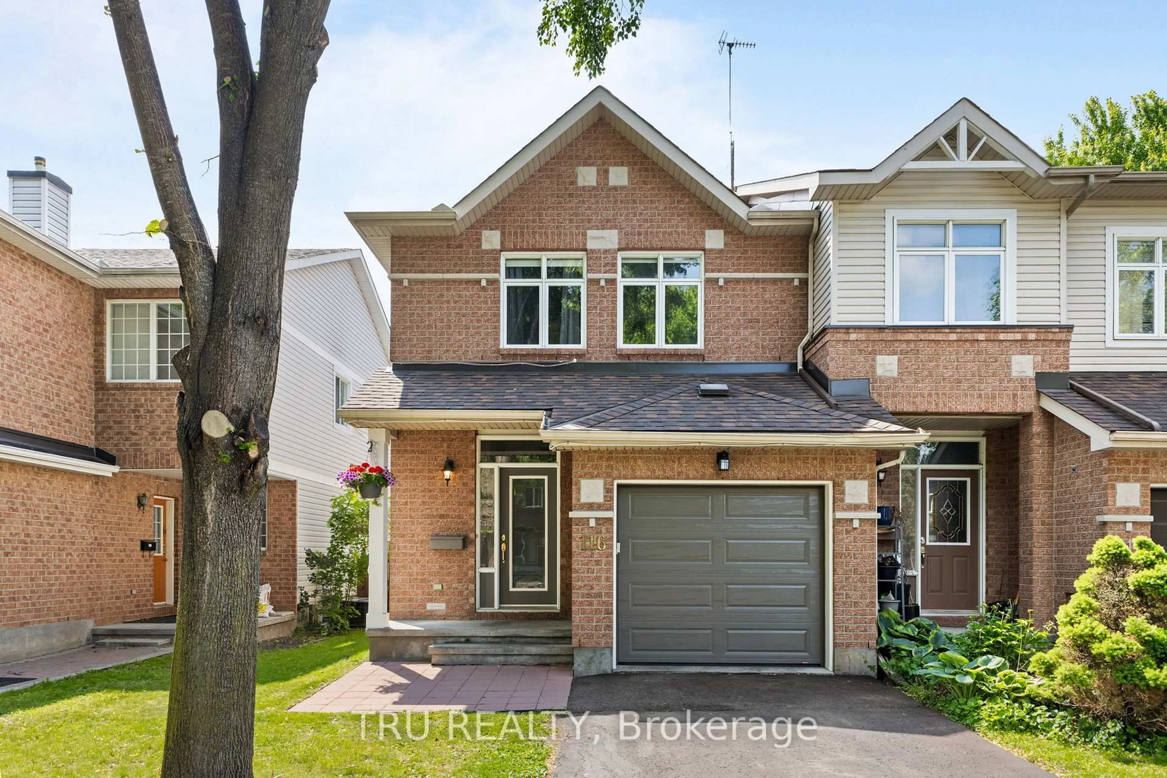 Home with brick exterior material, street for 116 Redpath Dr, Ottawa Ontario K2G 6K4