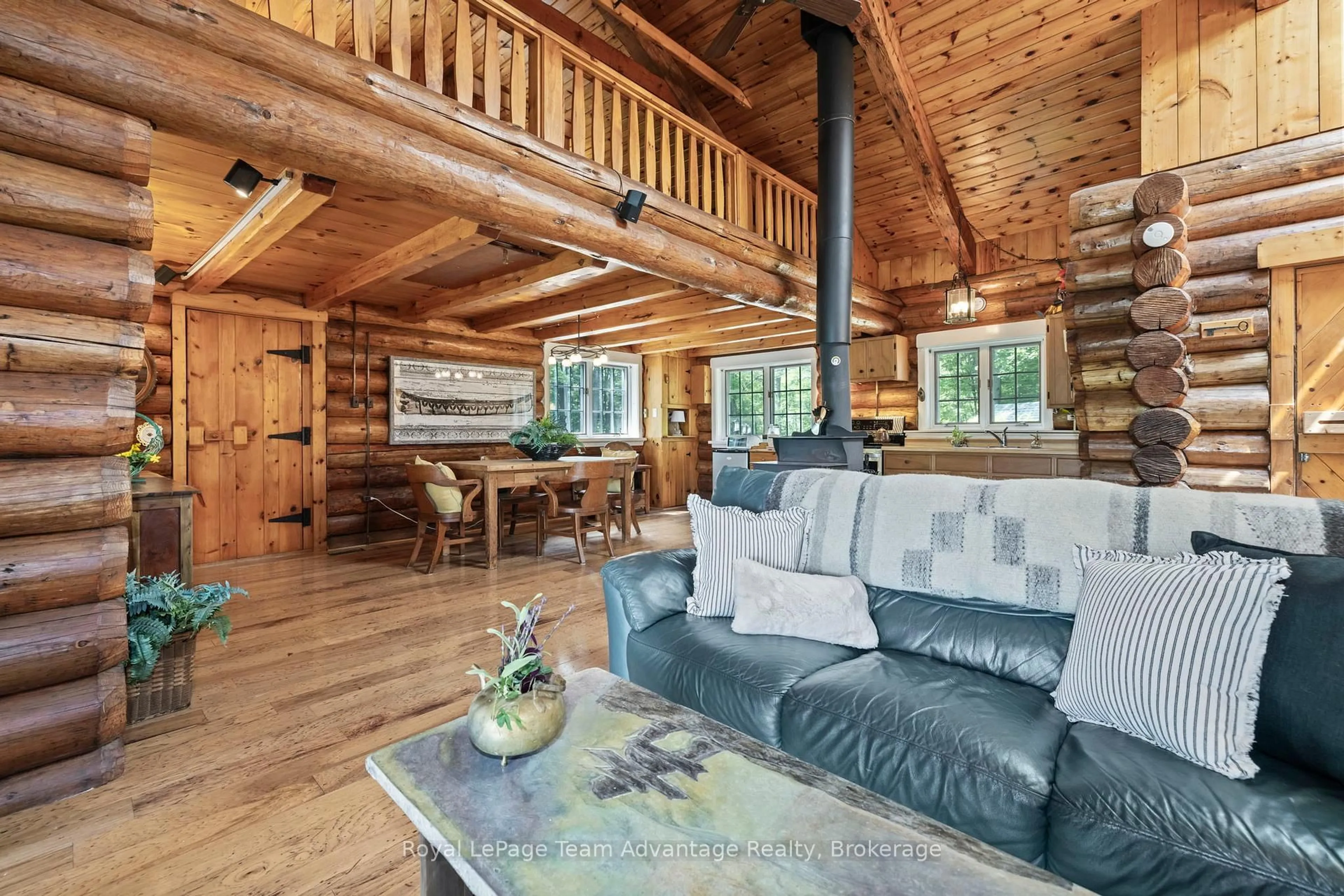 Living room with furniture, wood/laminate floor for 25 Limbert Lane, McDougall Ontario P2A 2W9