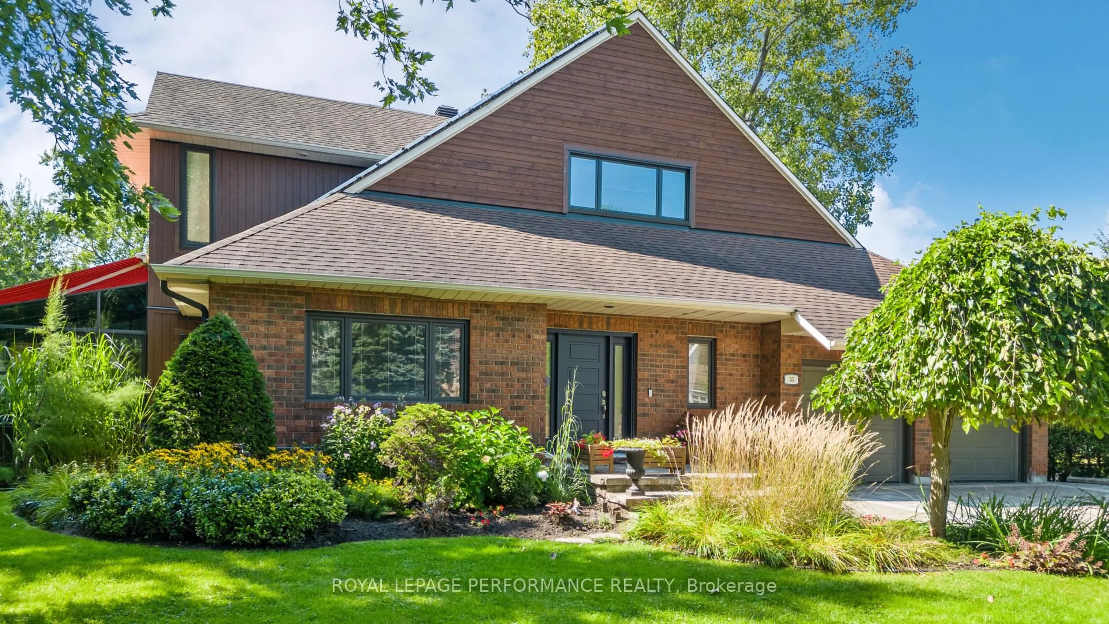 Home with brick exterior material, street for 55 Delong Dr, Ottawa Ontario K1J 7E4