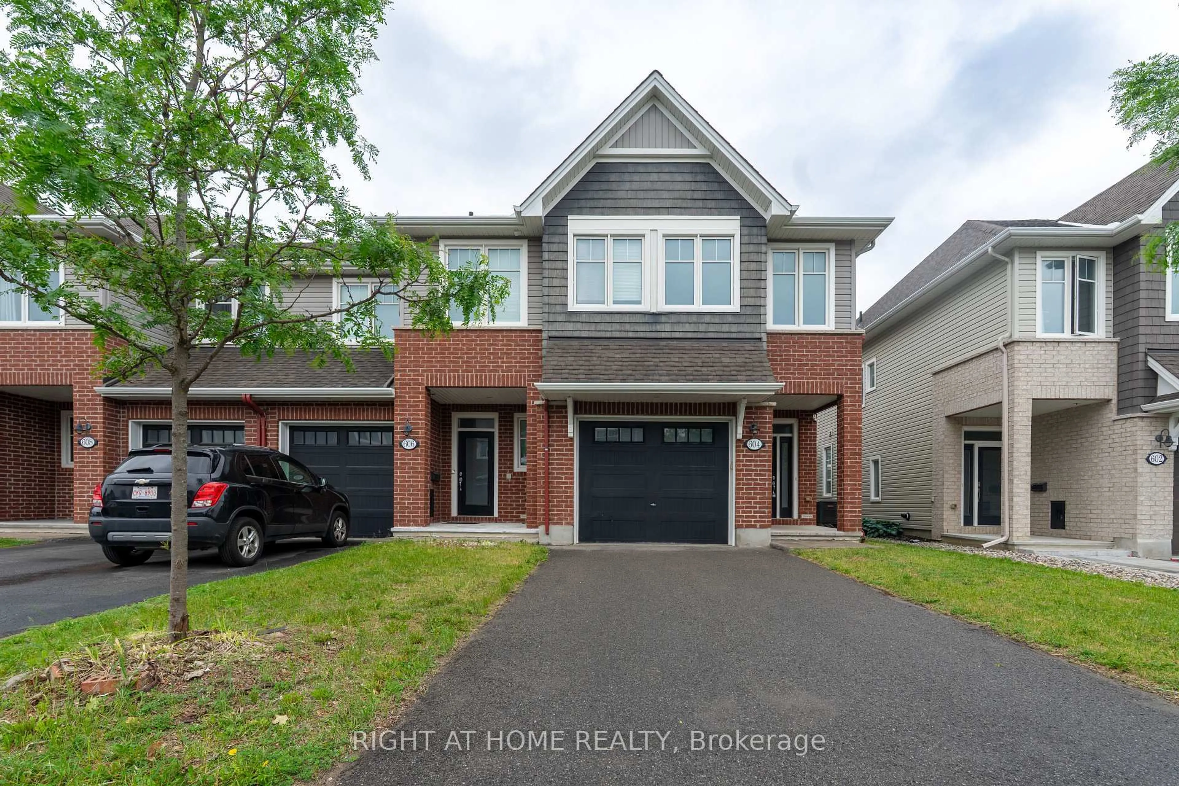 Home with brick exterior material, street for 604 Egret Way, Ottawa Ontario K2J 6K9