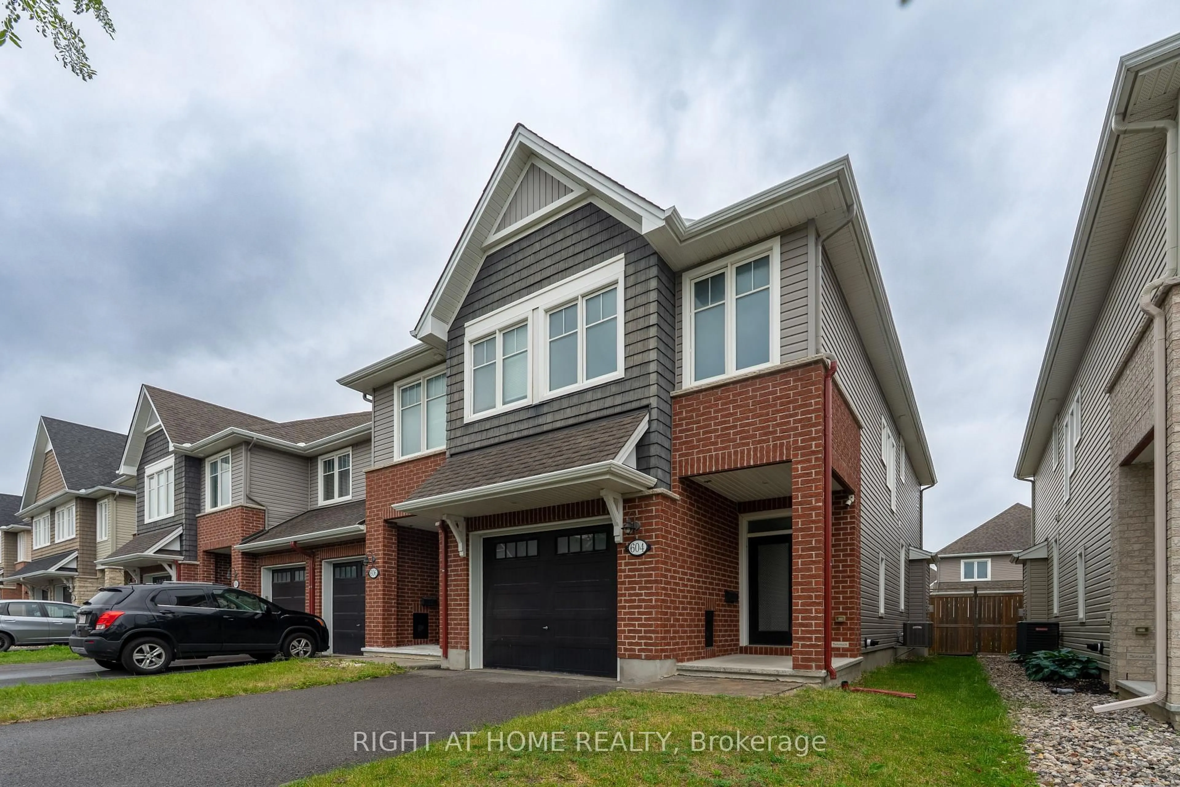 Home with brick exterior material, street for 604 Egret Way, Ottawa Ontario K2J 6K9