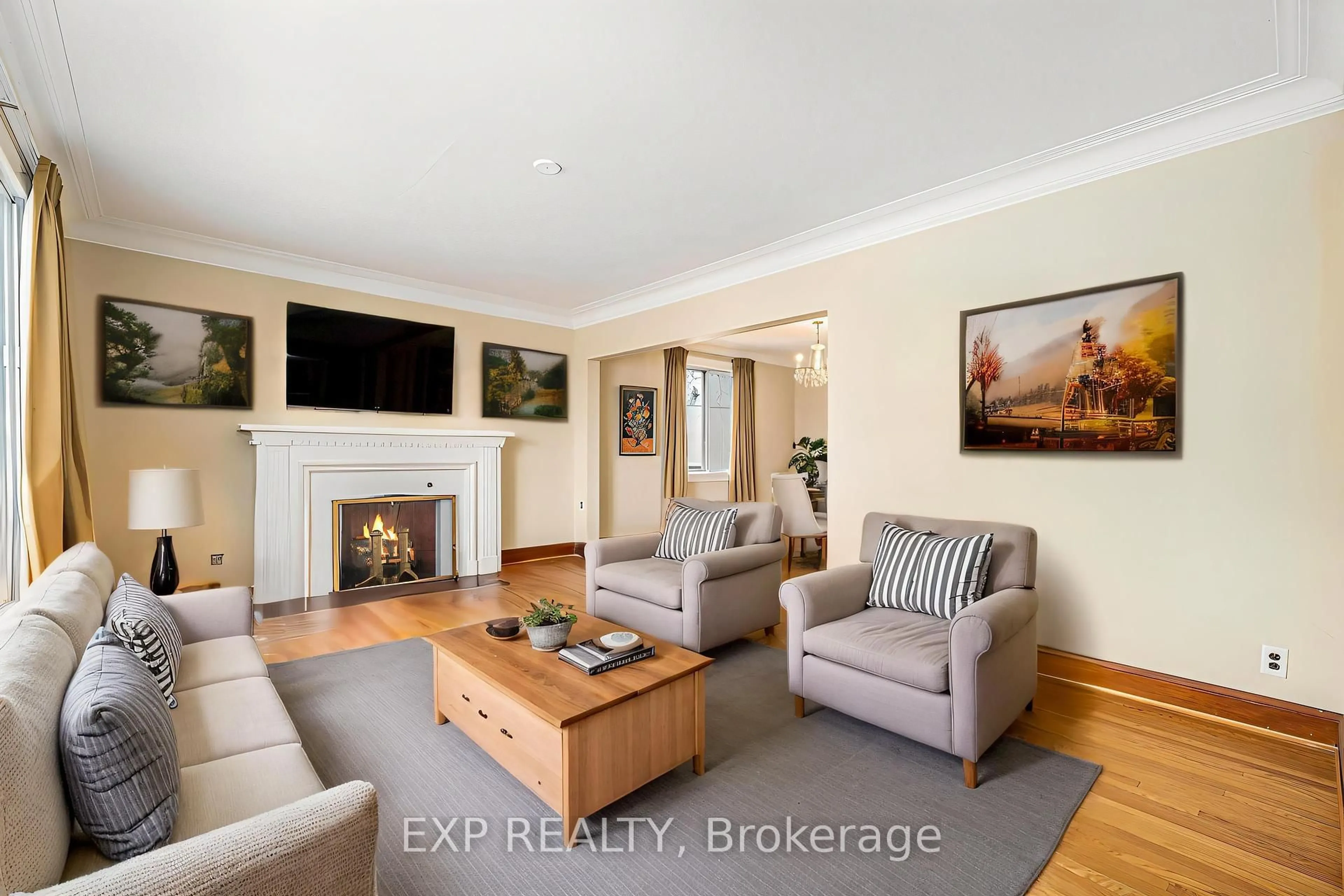 Living room with furniture, wood/laminate floor for 612 Byron Ave, Ottawa Ontario K2A 0E5