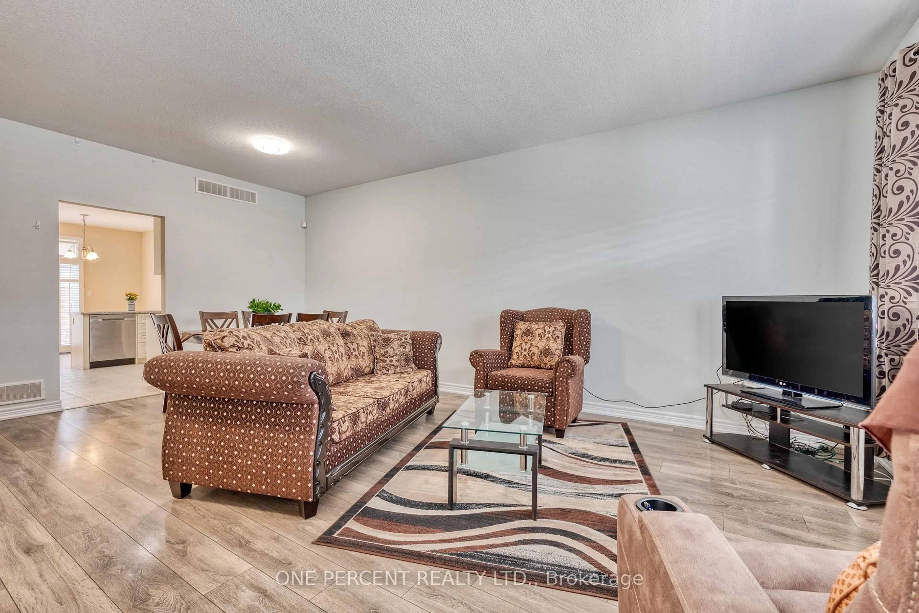 Living room with furniture, unknown for 21 Stickland Lane #21, Hamilton Ontario L0R 1C0