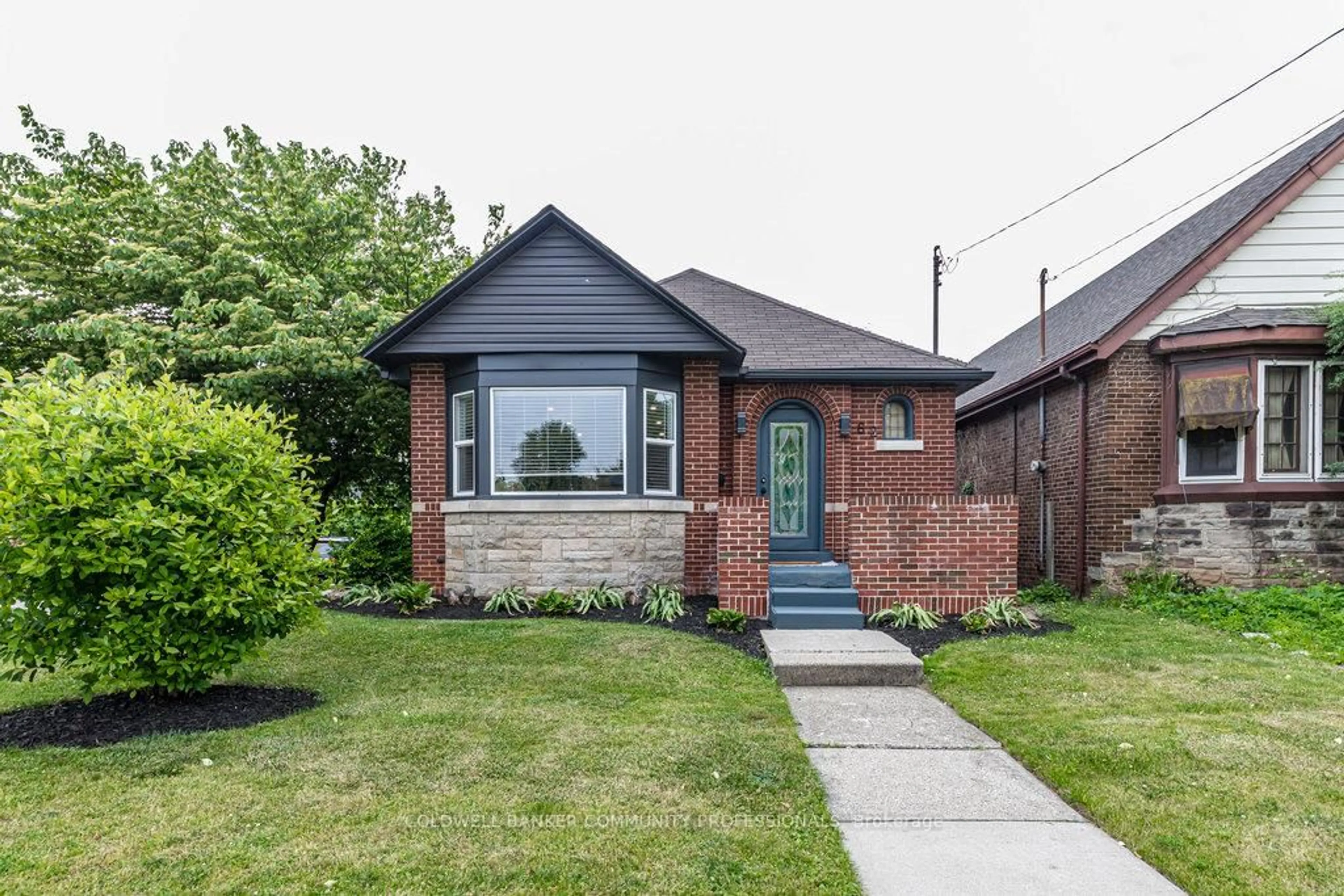 Home with brick exterior material, street for 62 Weir St, Hamilton Ontario L8H 5E6