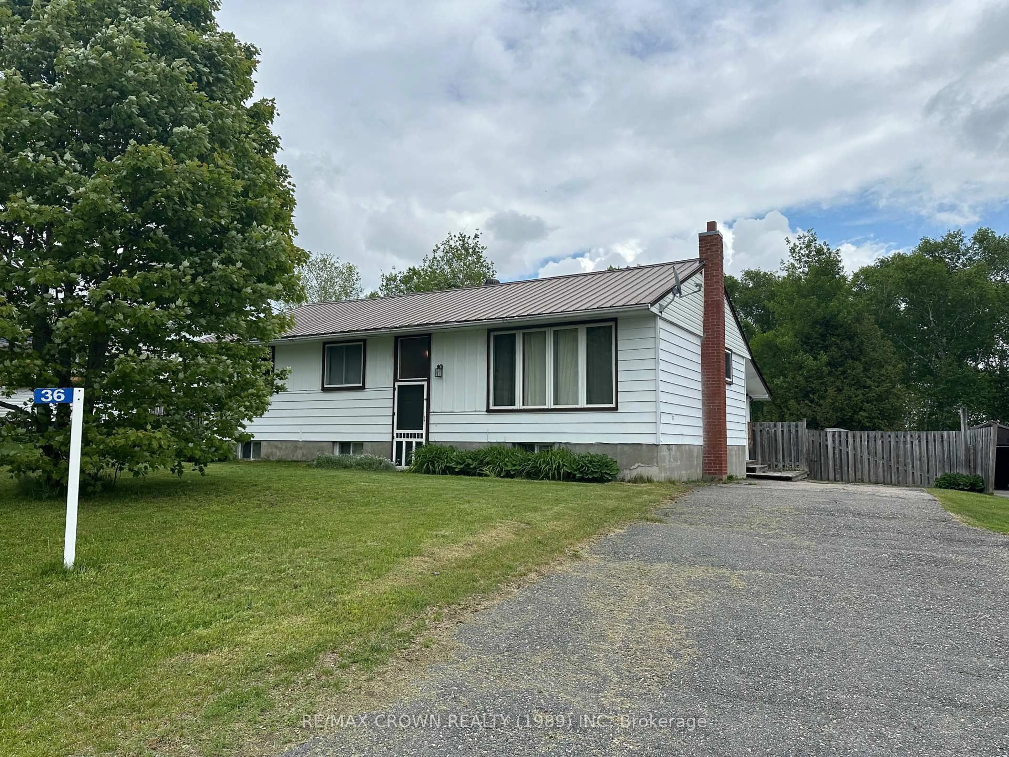 A pic from outside/outdoor area/front of a property/back of a property/a pic from drone, street for 36 Birch Cres, Temagami Ontario P0H 2H0