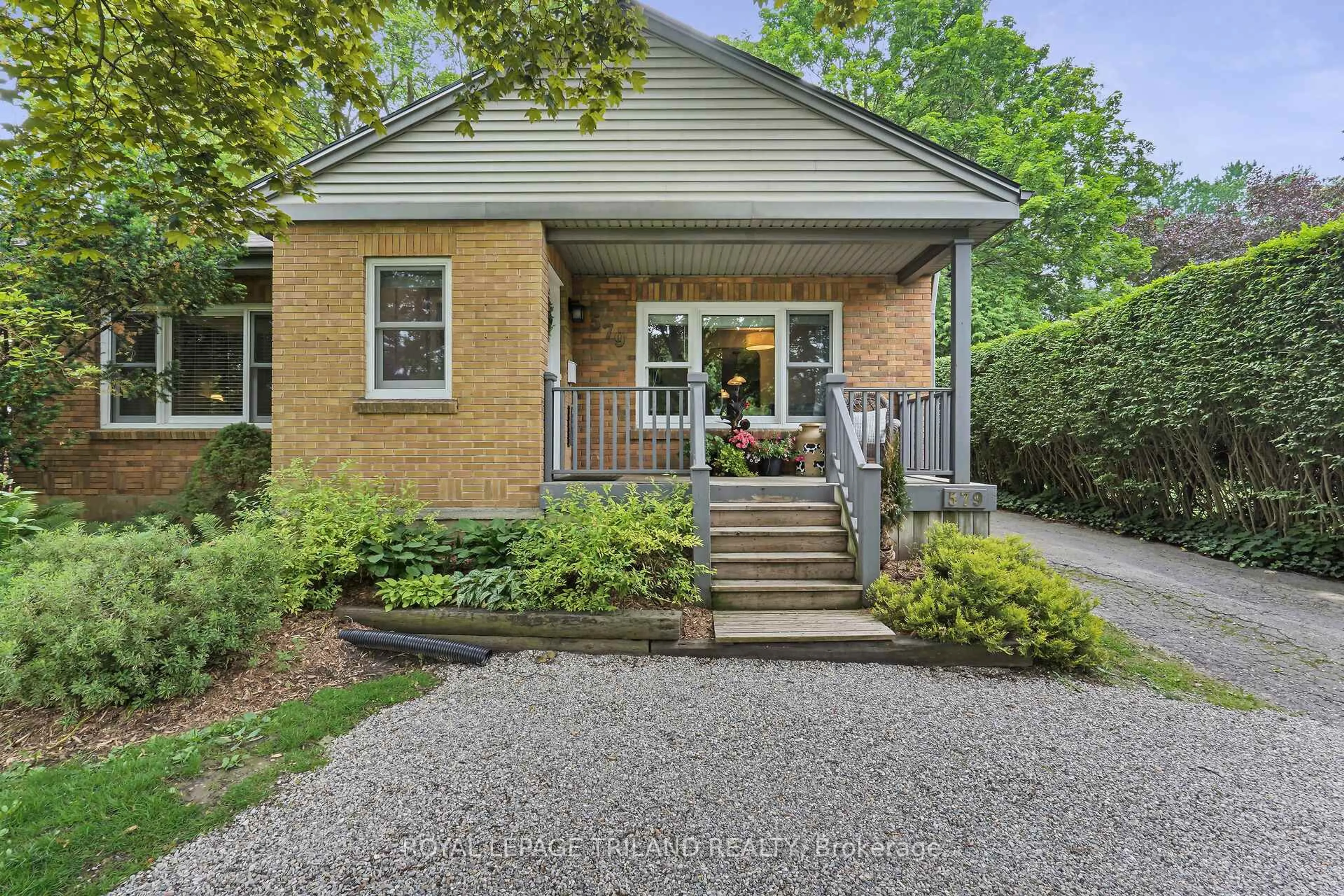 Home with brick exterior material, street for 579 Regent St, London East Ontario N5Y 4H7