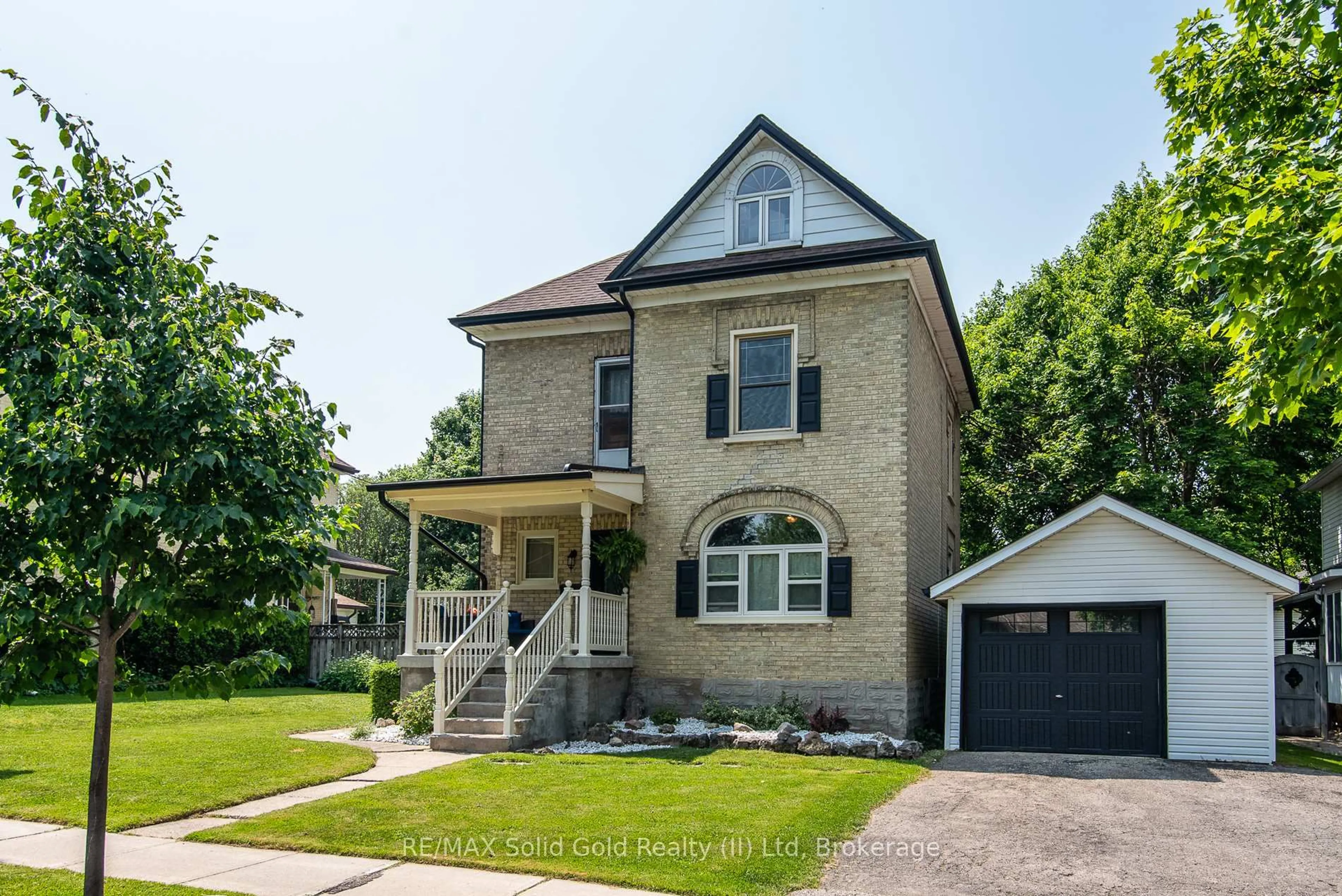 Home with brick exterior material, street for 26 Queen St, Woolwich Ontario N3B 2T1