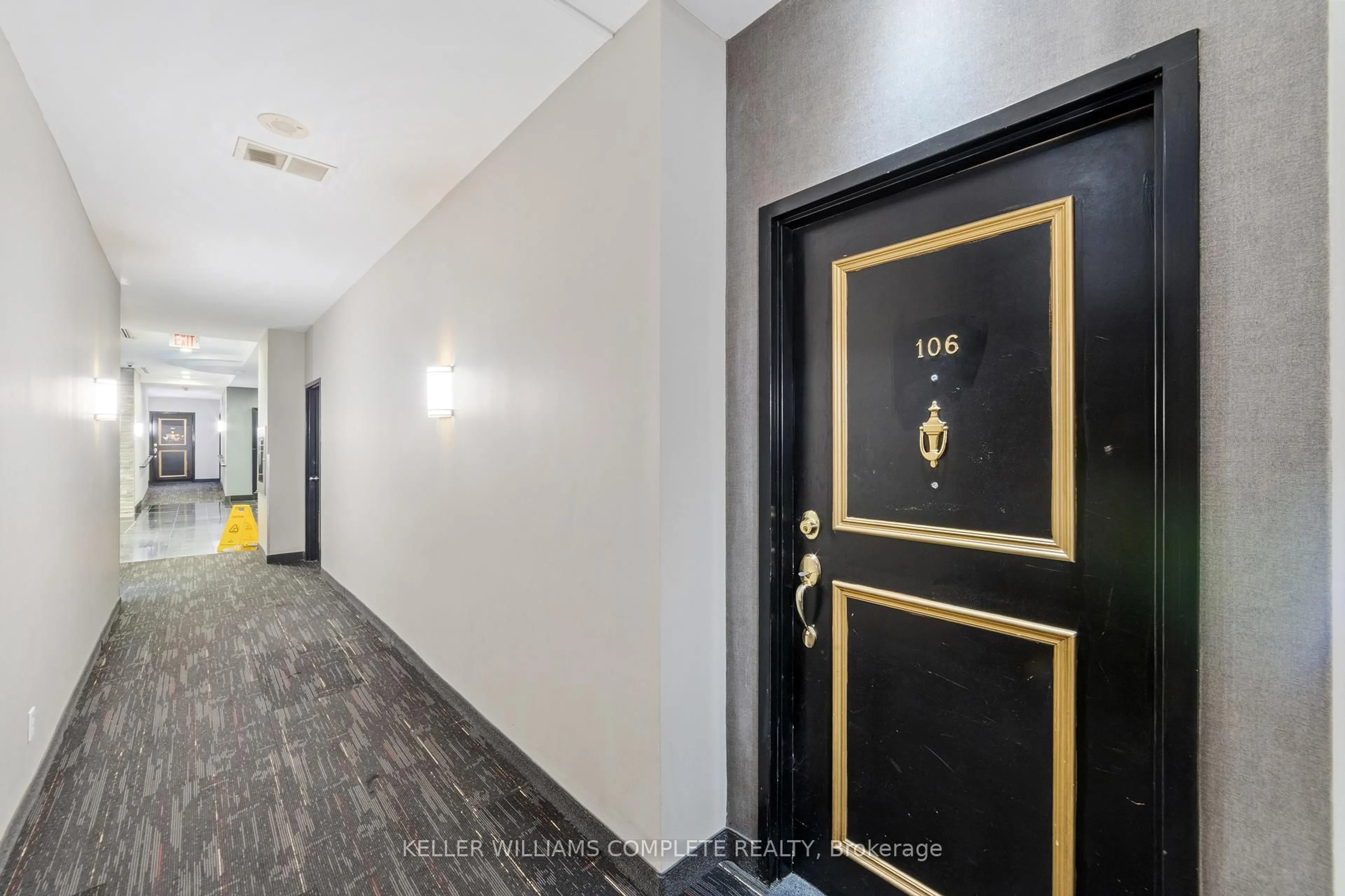 Indoor foyer for 135 James St #106, Hamilton Ontario L8P 2Z6