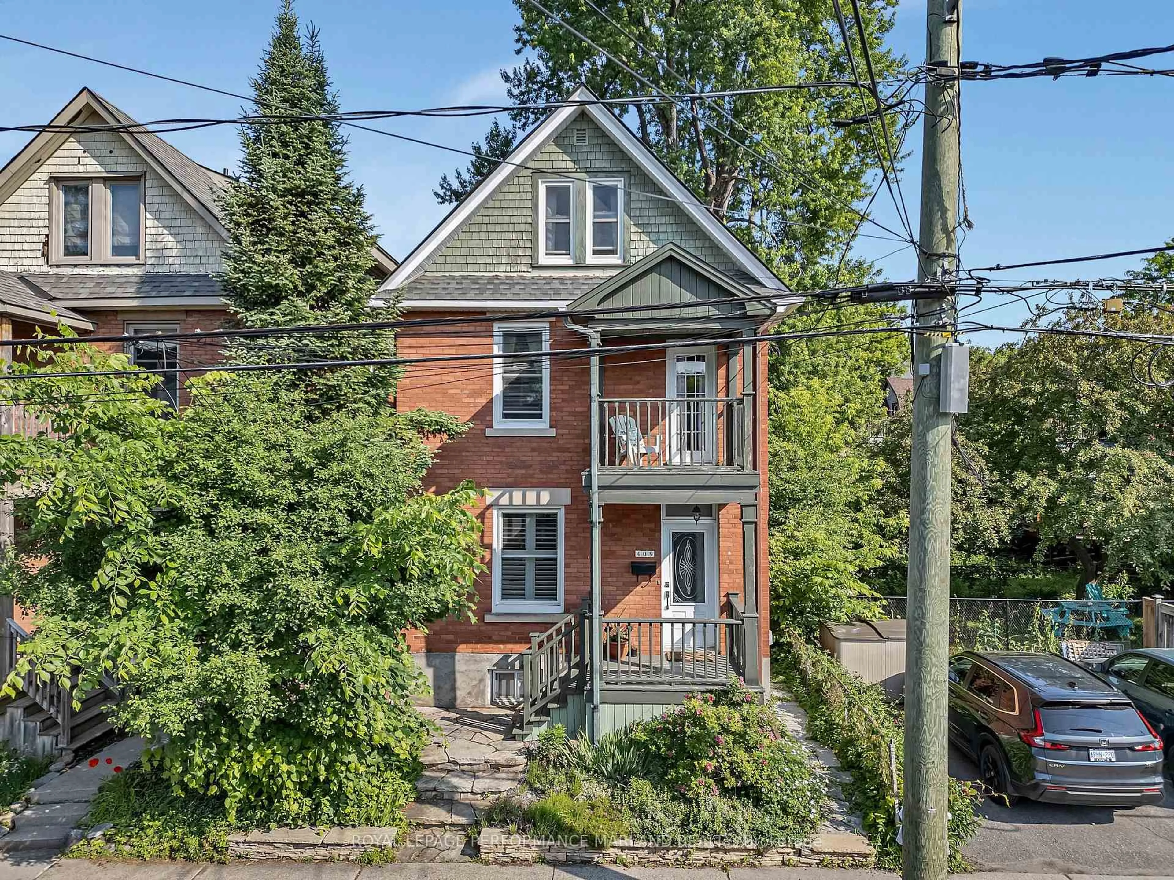 Home with brick exterior material, street for 409 Sunnyside Ave, Ottawa Ontario K1S 0S5