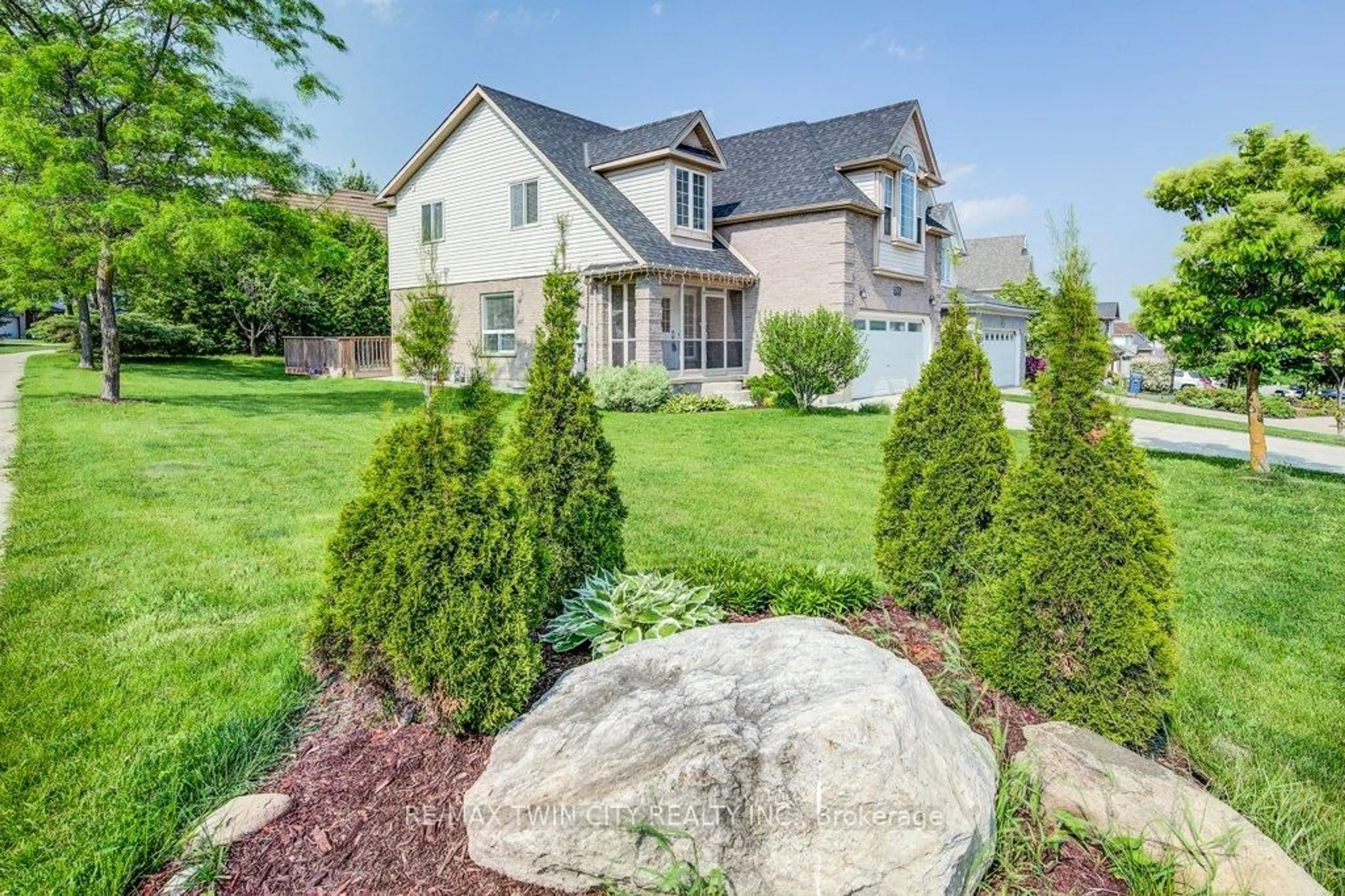 Home with brick exterior material, street for 153 Starwood Dr, Guelph Ontario N1E 7G7