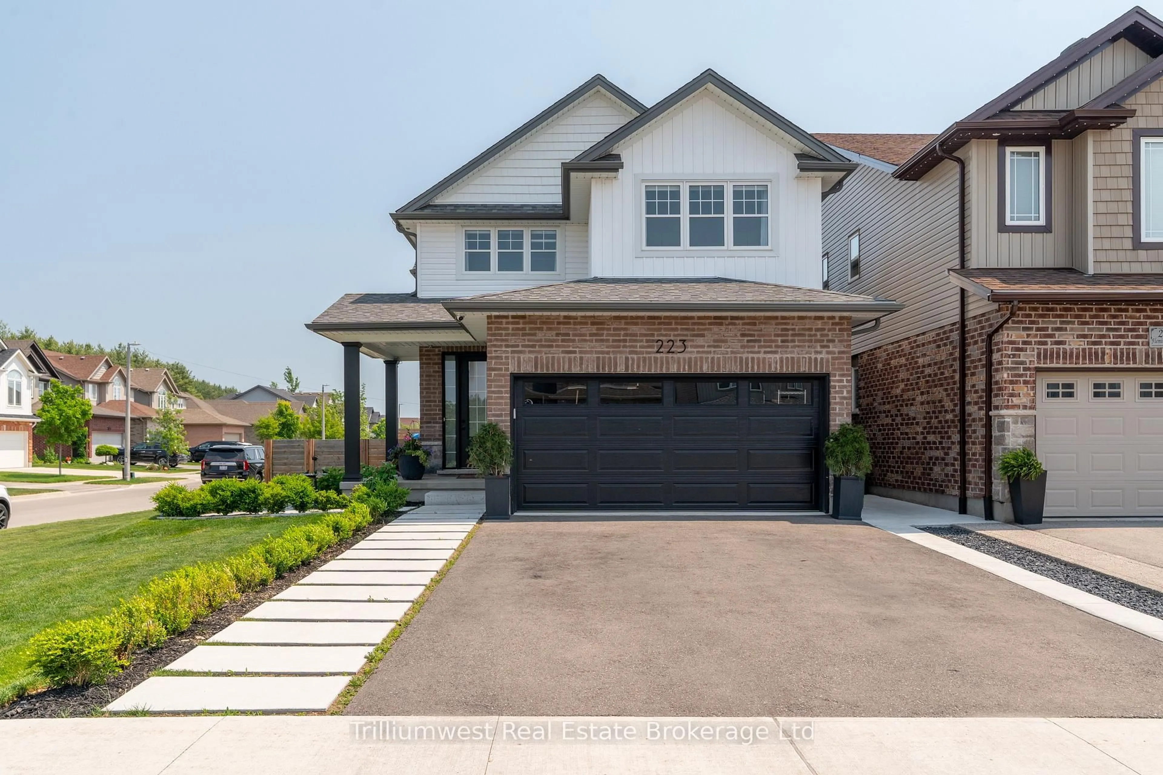 Home with brick exterior material, street for 223 Fleming Rd, Guelph Ontario N1E 0K7